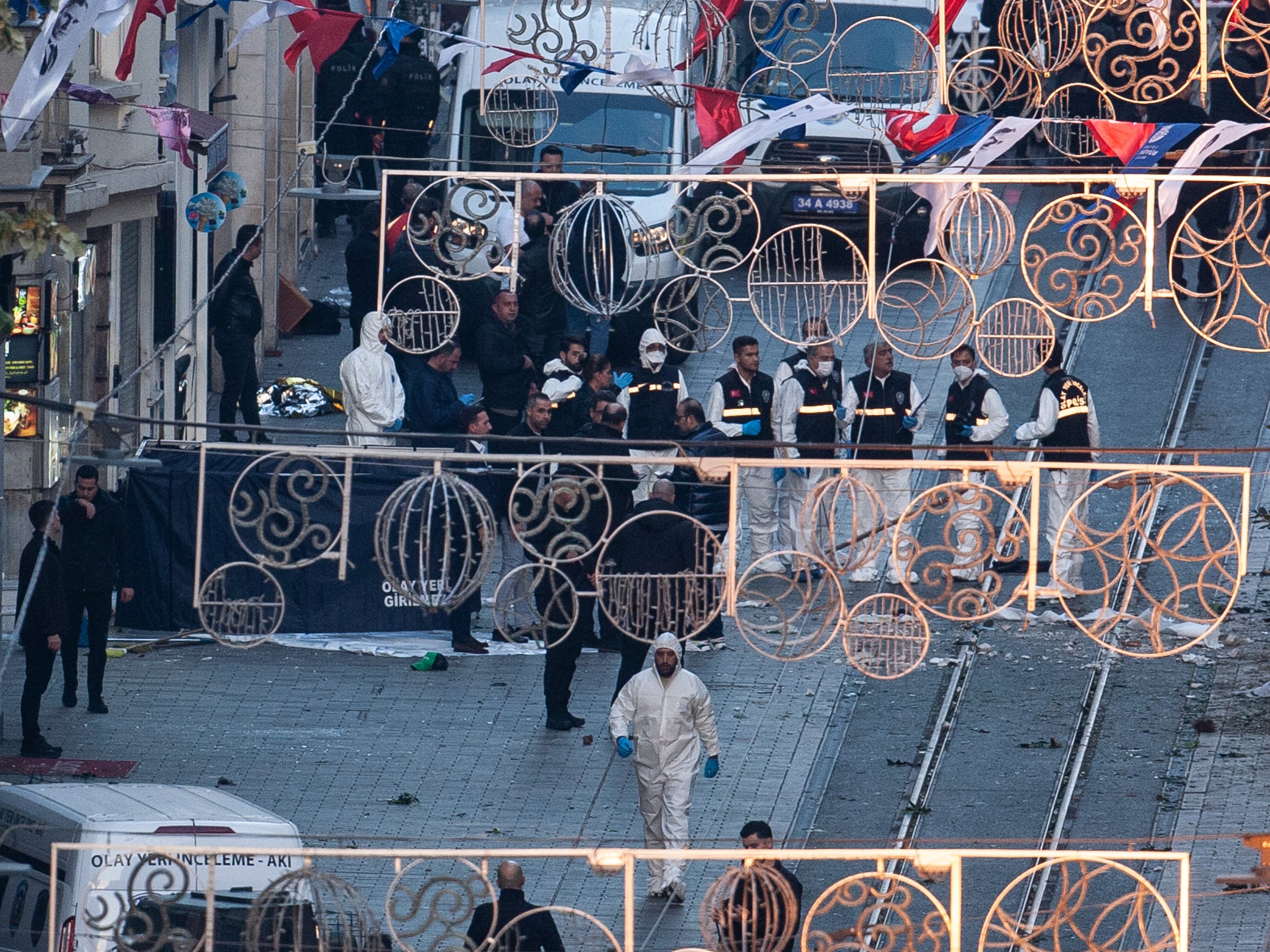 Emergency personnel investigate the scene after an explosion on Istiklal Street