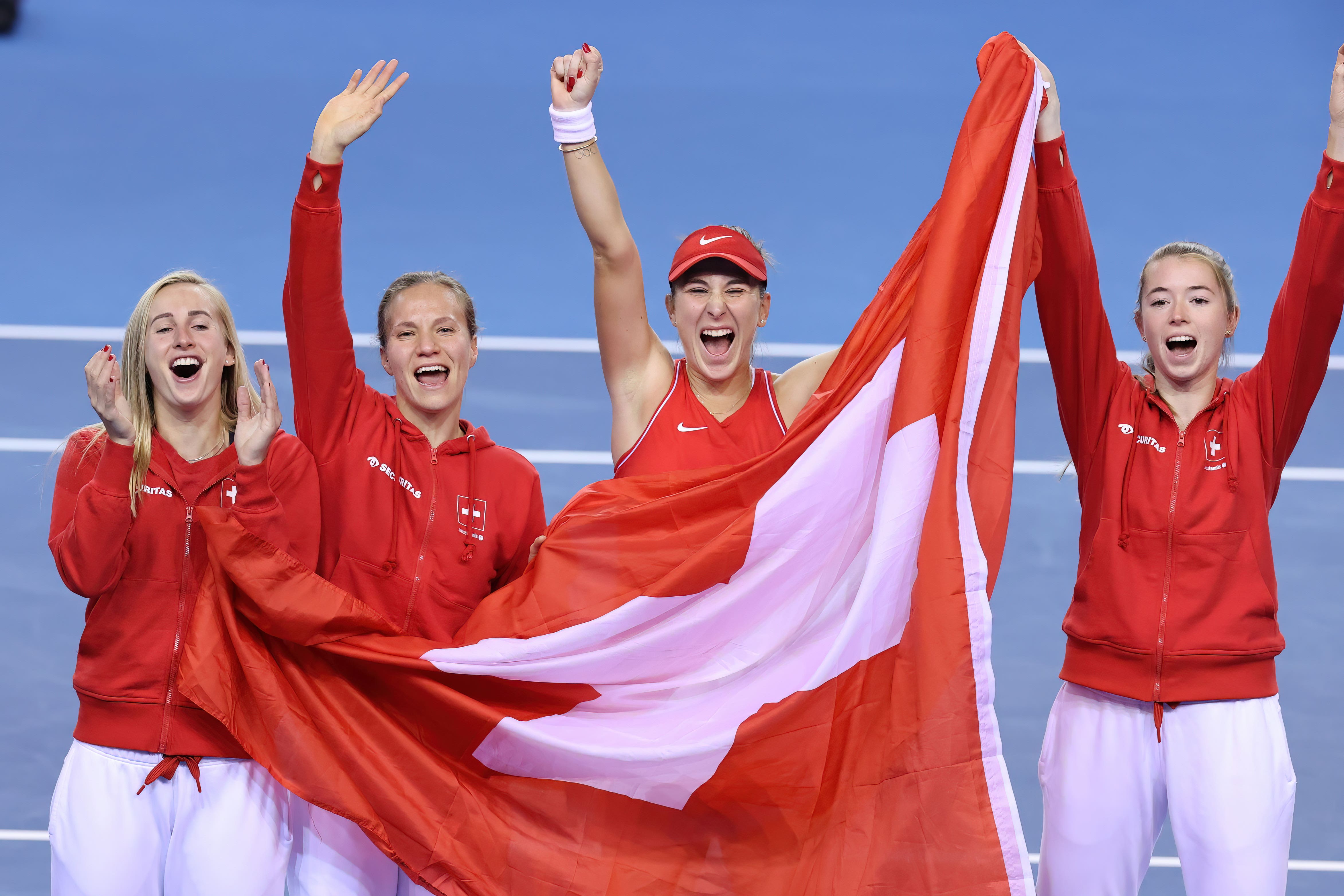 Switzerland celebrate their victory over Australia in Glasgow (Steve Walsh/PA).