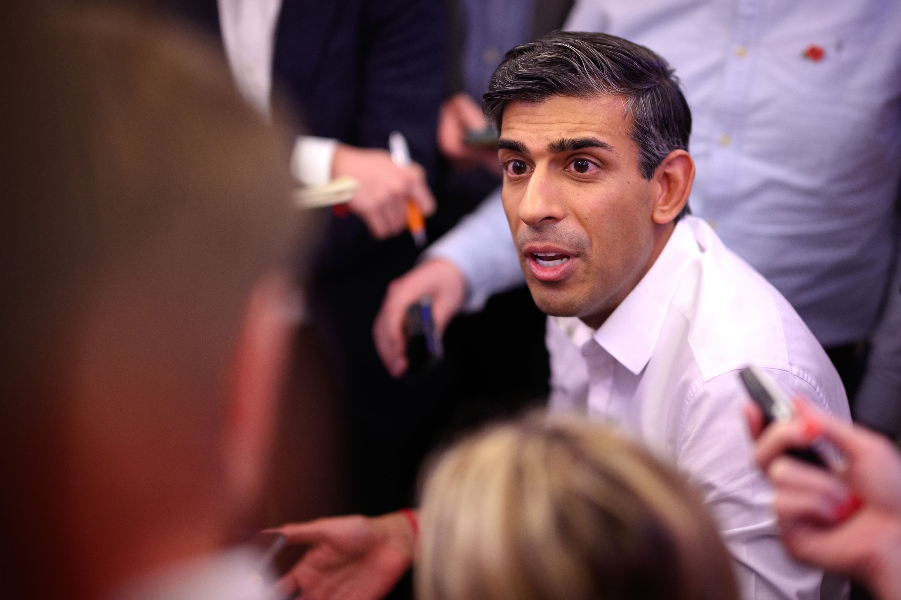 Prime Minister Rishi Sunak holds a ‘huddle’ press conference with political journalists on board a Government plane as he heads to Bali (Leon Neal/PA)