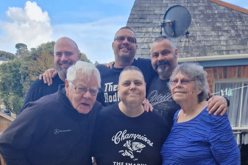 Ann with her parents (front), husband (back left) and her twin brothers Rodney and Norman (back) (Collect/PA Real Life)