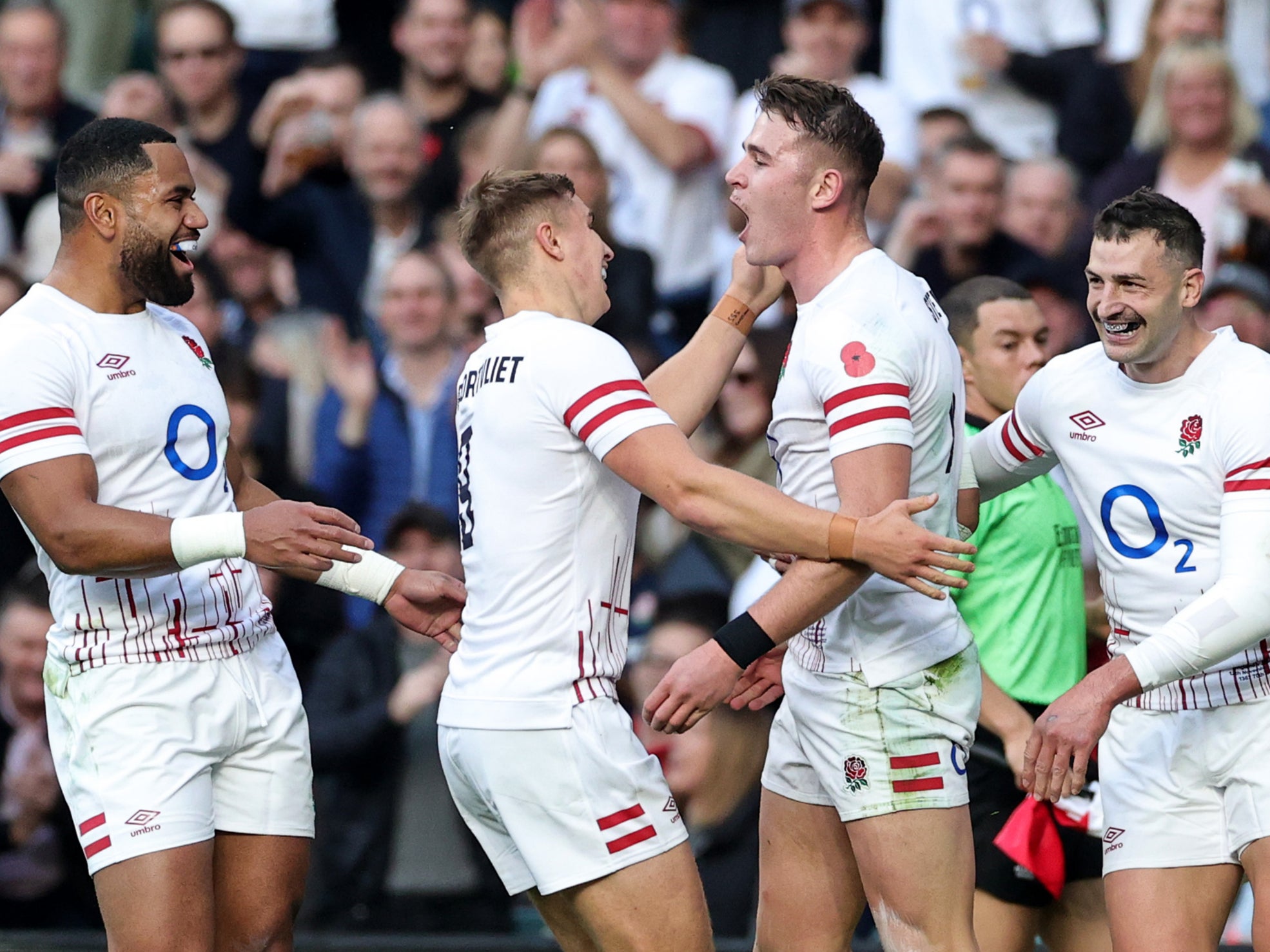 Freddie Steward (second right) celebrates scoring England’s first try against Japan