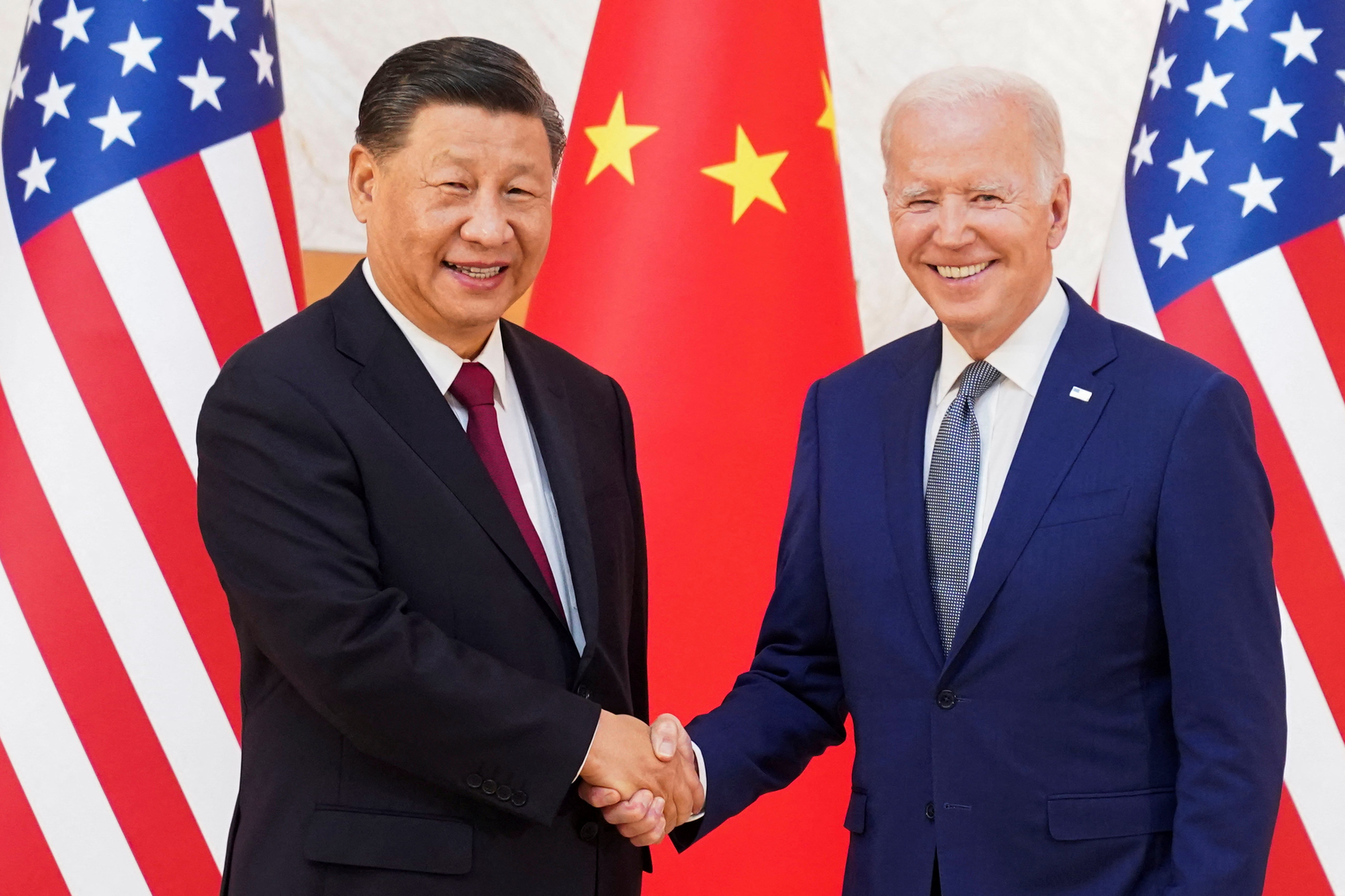 US president Joe Biden shakes hands with Chinese president Xi Jinping as they meet on the sidelines of the G20 leaders' summit in Bali