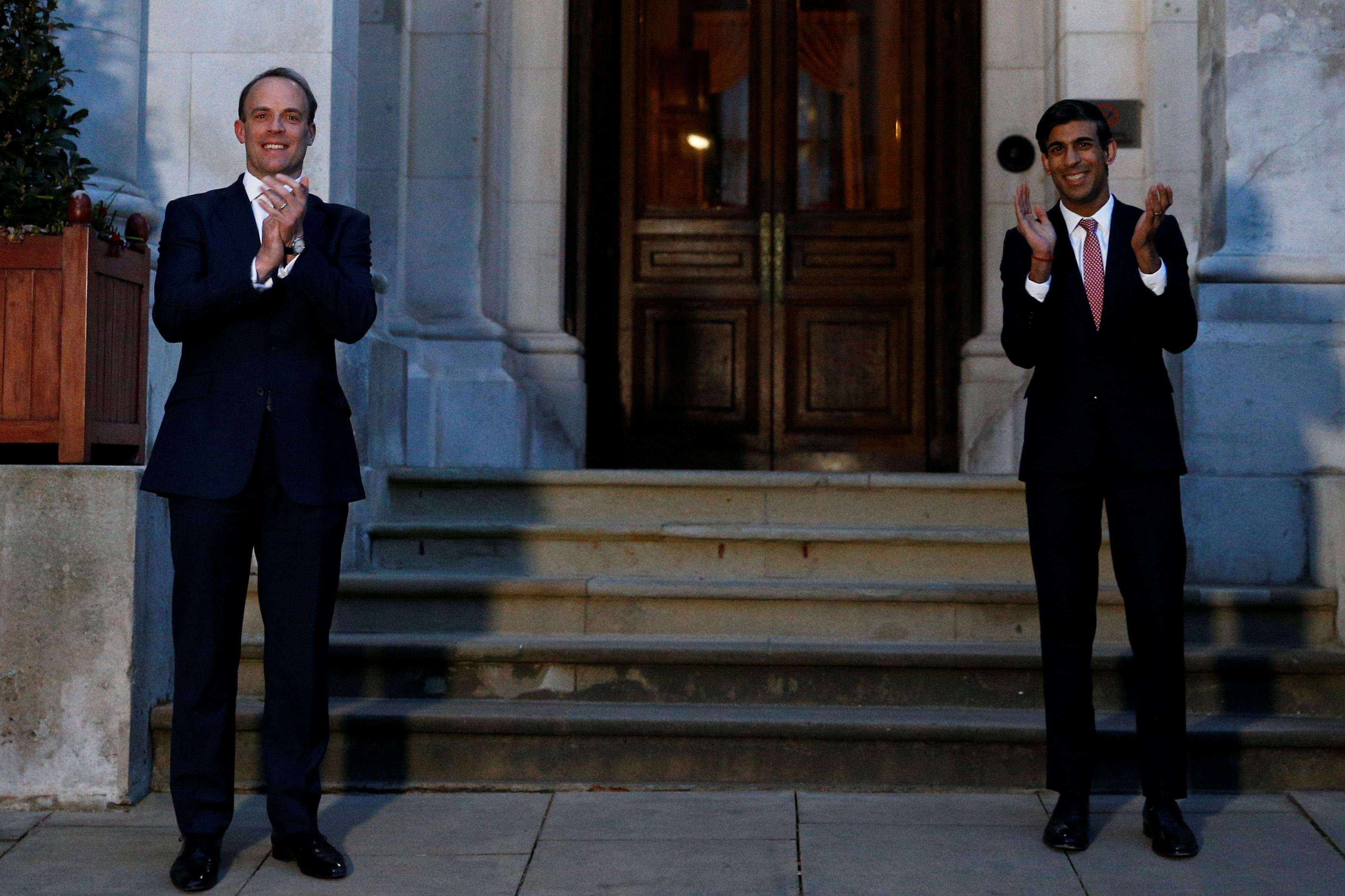 Rishi Sunak has come out in defence of Dominic Raab (left) after the Deputy Prime Minister was accused of rude and demeaning behaviour towards civil servants (Henry Nicholls/PA)