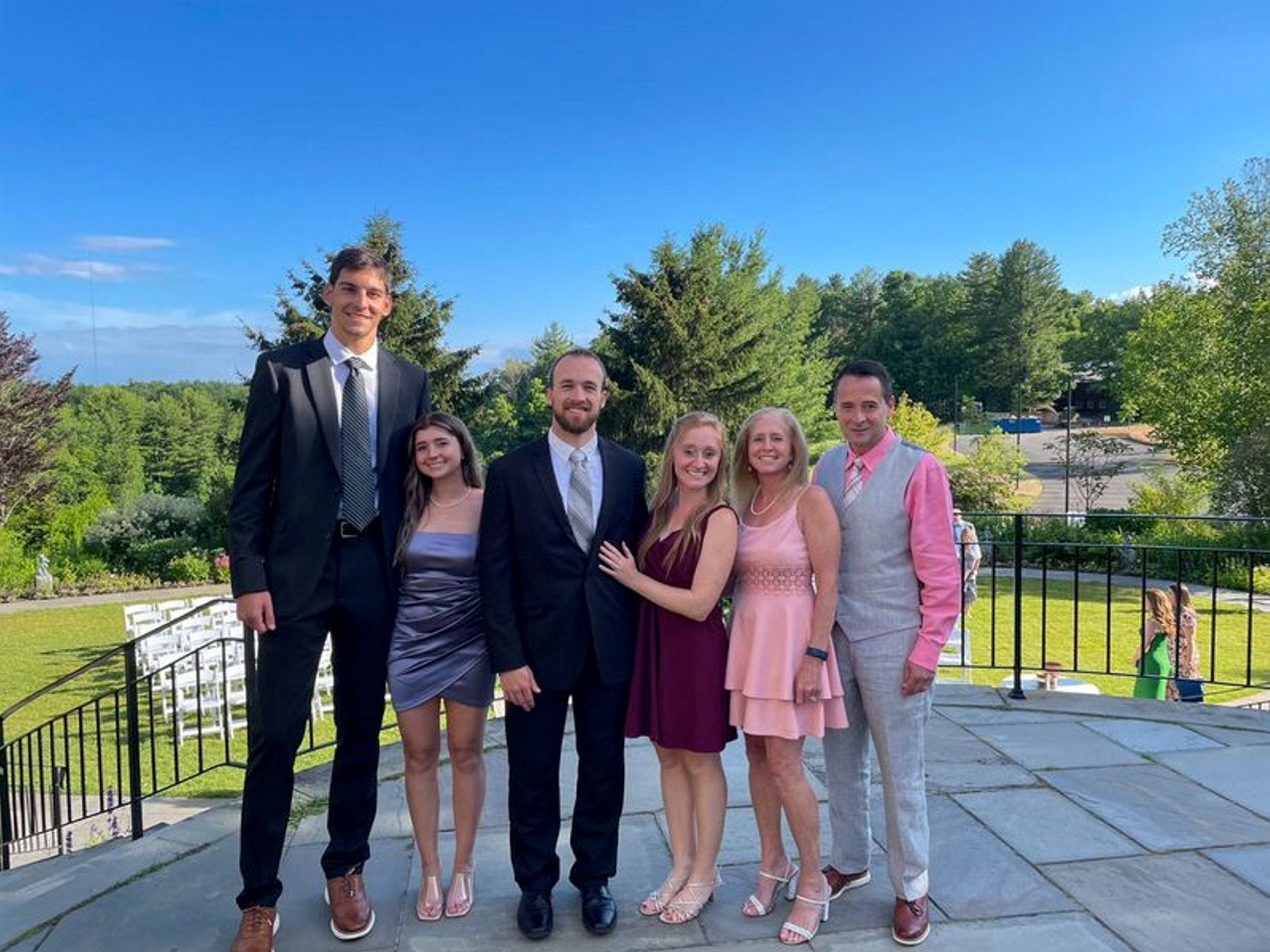 Dylan Painter and his partner Brooke Dostillio and her family (Photo: SWNS)