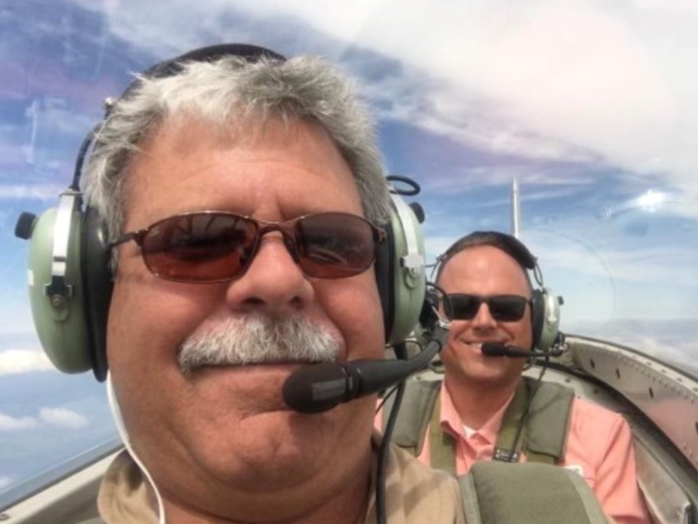 Pilot Craig Hutain (front) is pictured with friend Dale McLeod (back)