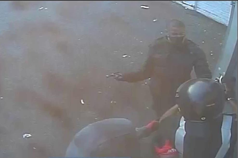 One of the gang during a robbery outside a branch of Tesco in 2018 ((Metropolitan Police/PA)