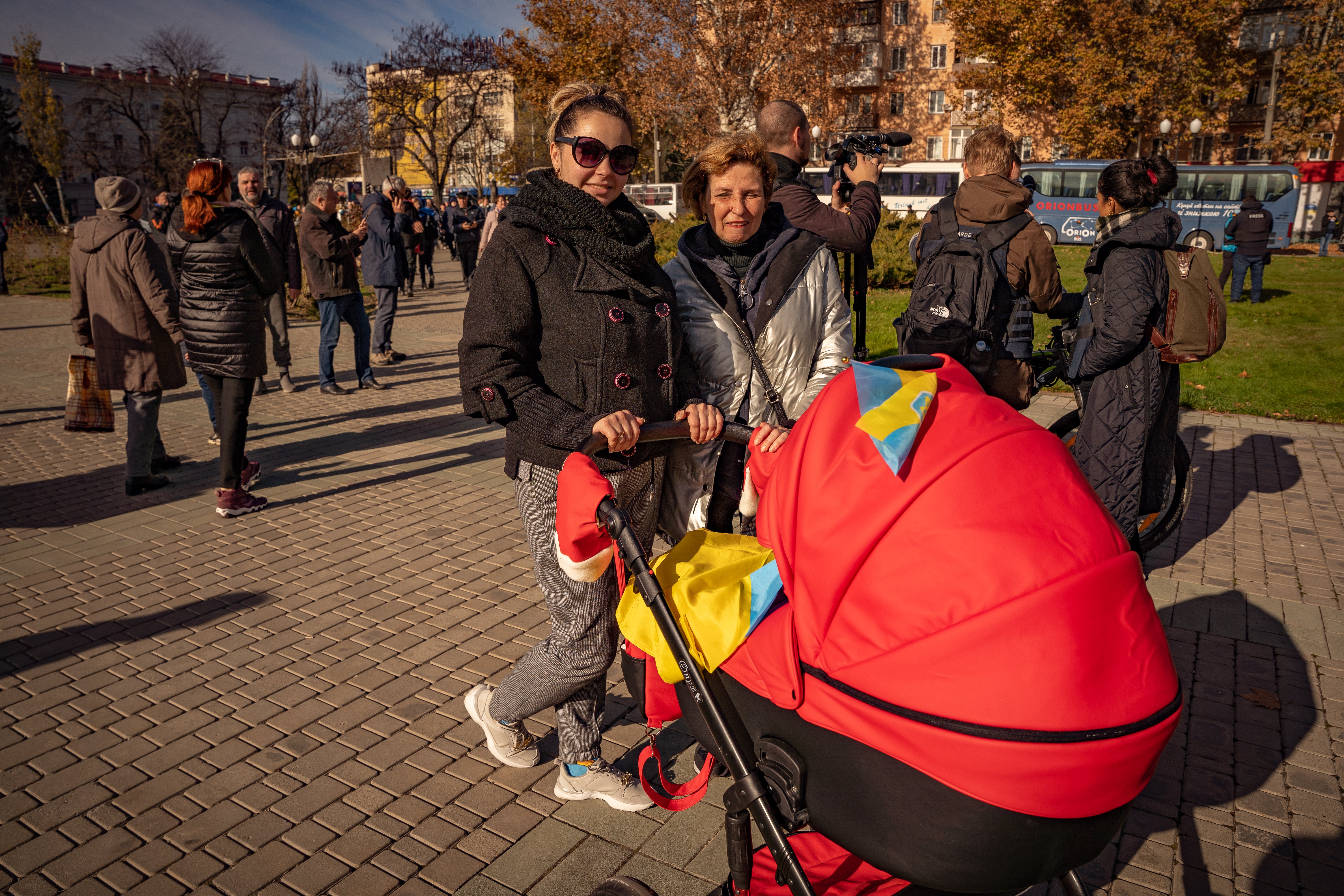 Ukrainians in newly-liberated Kherson’s central square celebrate their freedom from Russian occupation