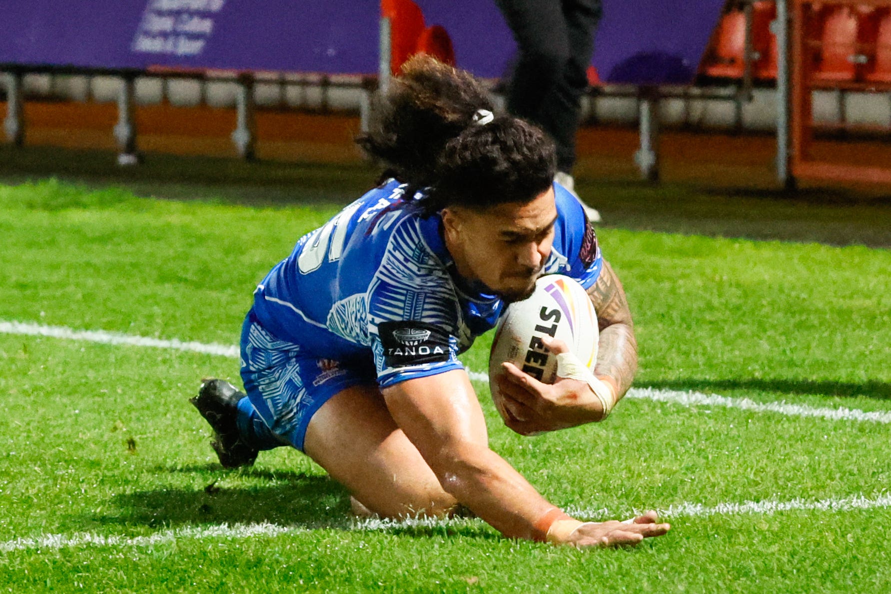 Tim Lafai scores one of his two tries in Samoa’s semi-final win over England (PA Images/Richard Sellers)