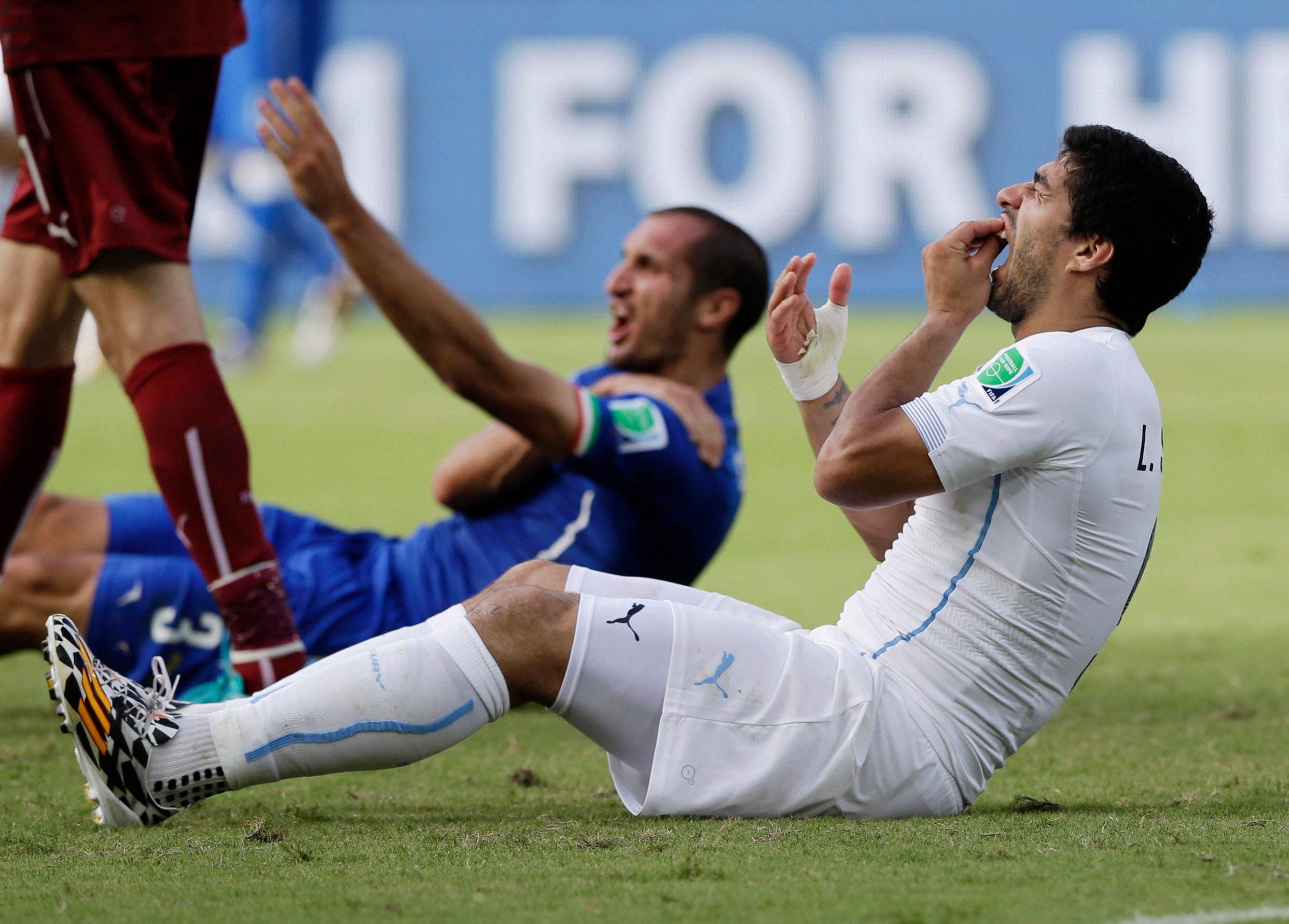 Suarez and Chiellini react to the incident