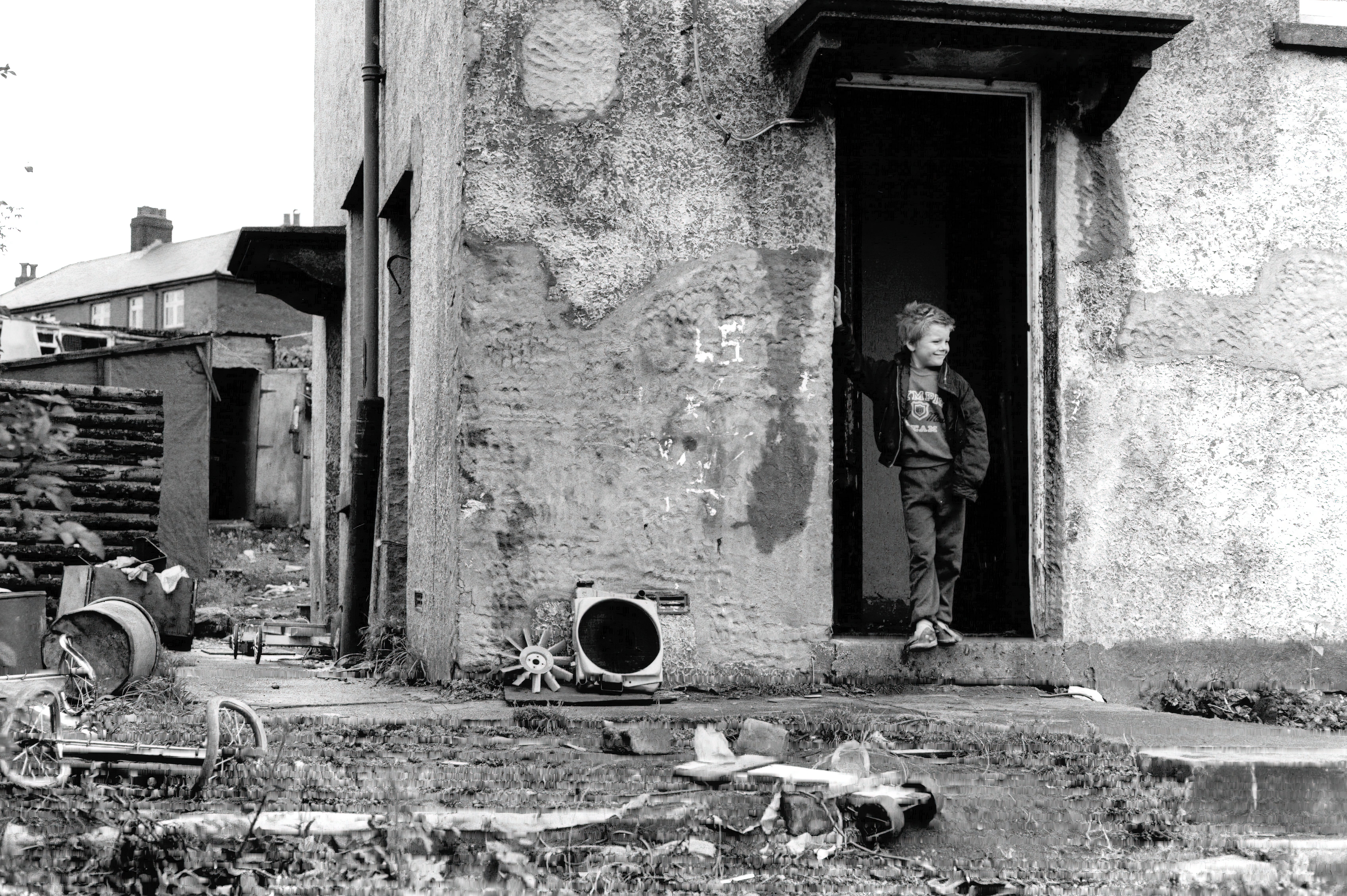 Boy smiling in Cynon Valley, a former coal mining valley in Wales.