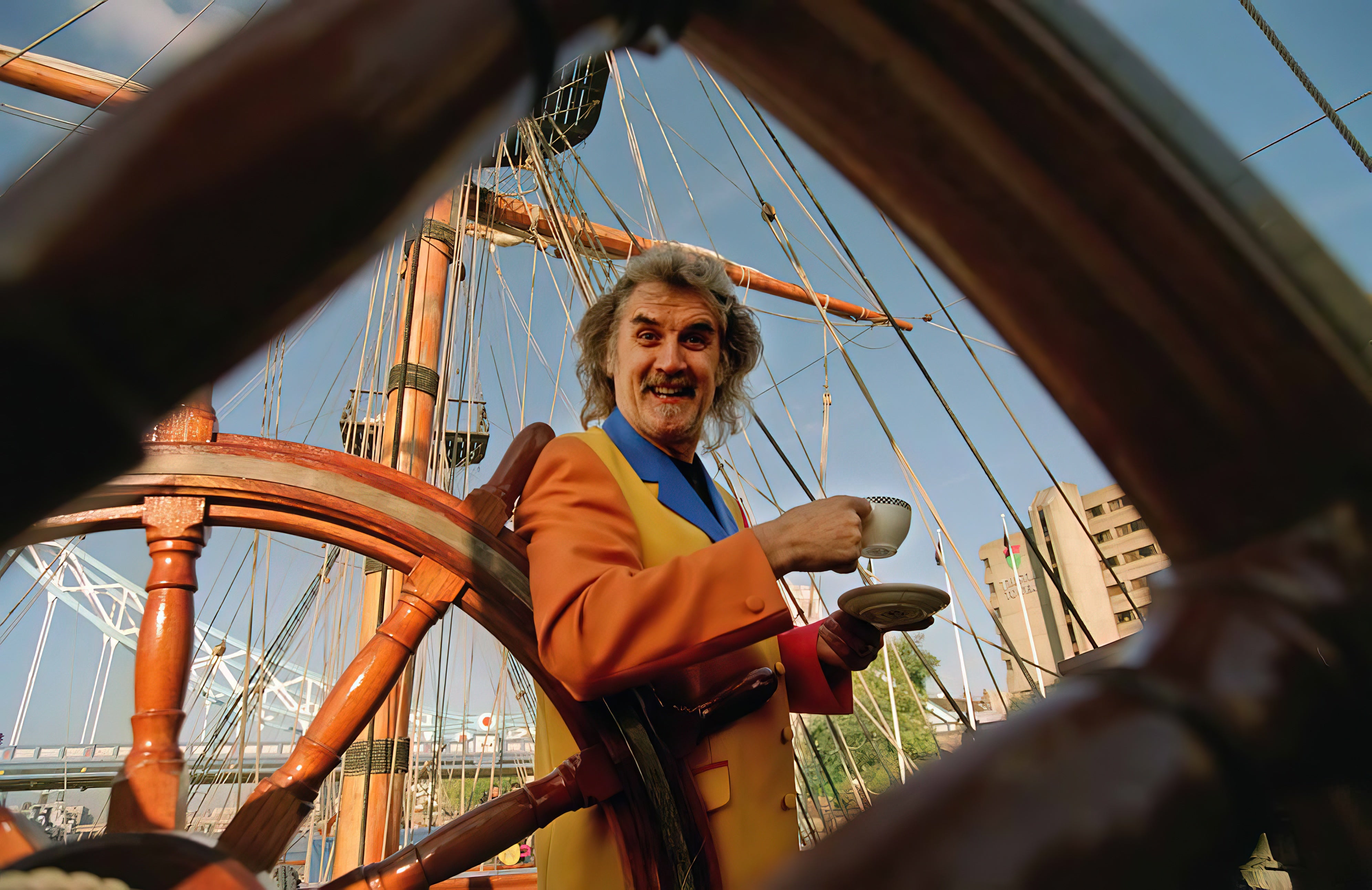 Billy Connolly drinks a cup of ‘tickety-boo’ tea on board a square-rigged ship named The Grand Turk. The profits from this tea went to charities aiding people in need, particularly children.