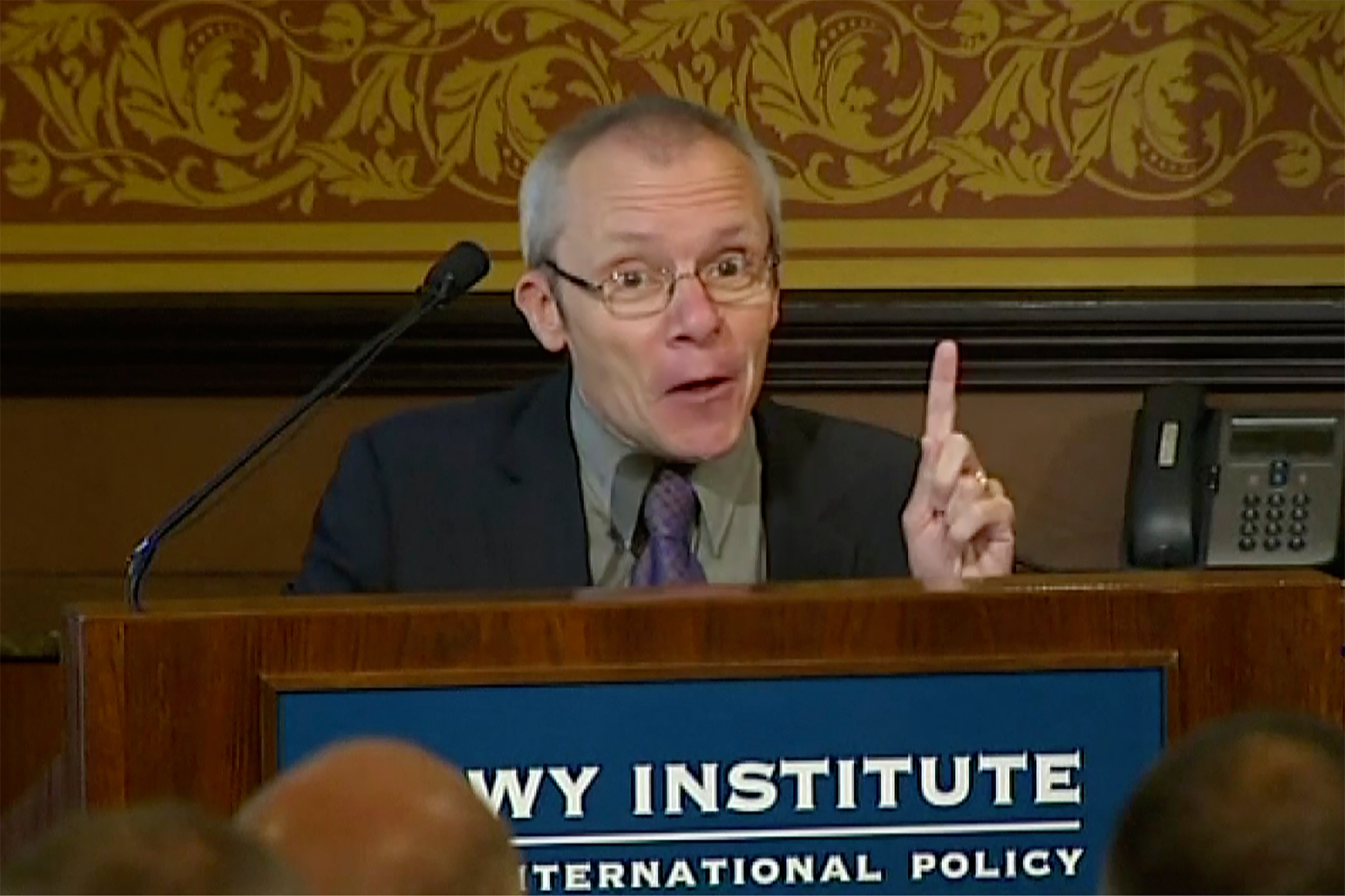 Sean Turnell, an economist at Australia's Macquarie University, speaks in front of audience at the Lowy Institute in Sydney