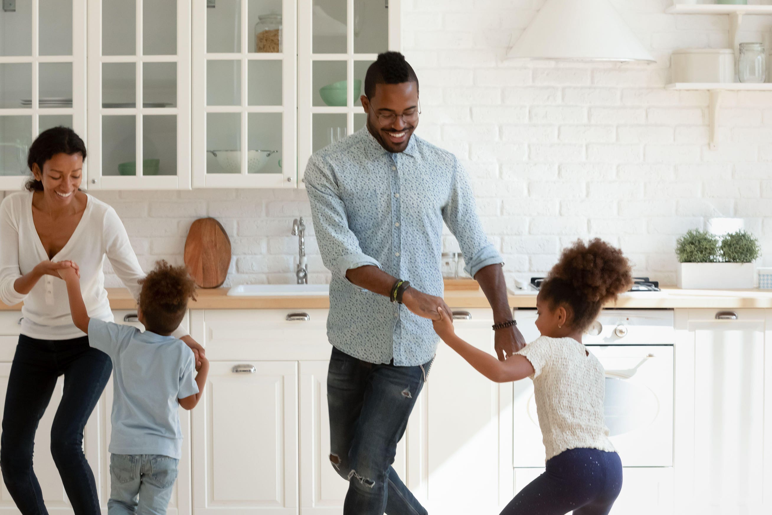 Playing with kids can help you get more active at home (Alamy/PA)