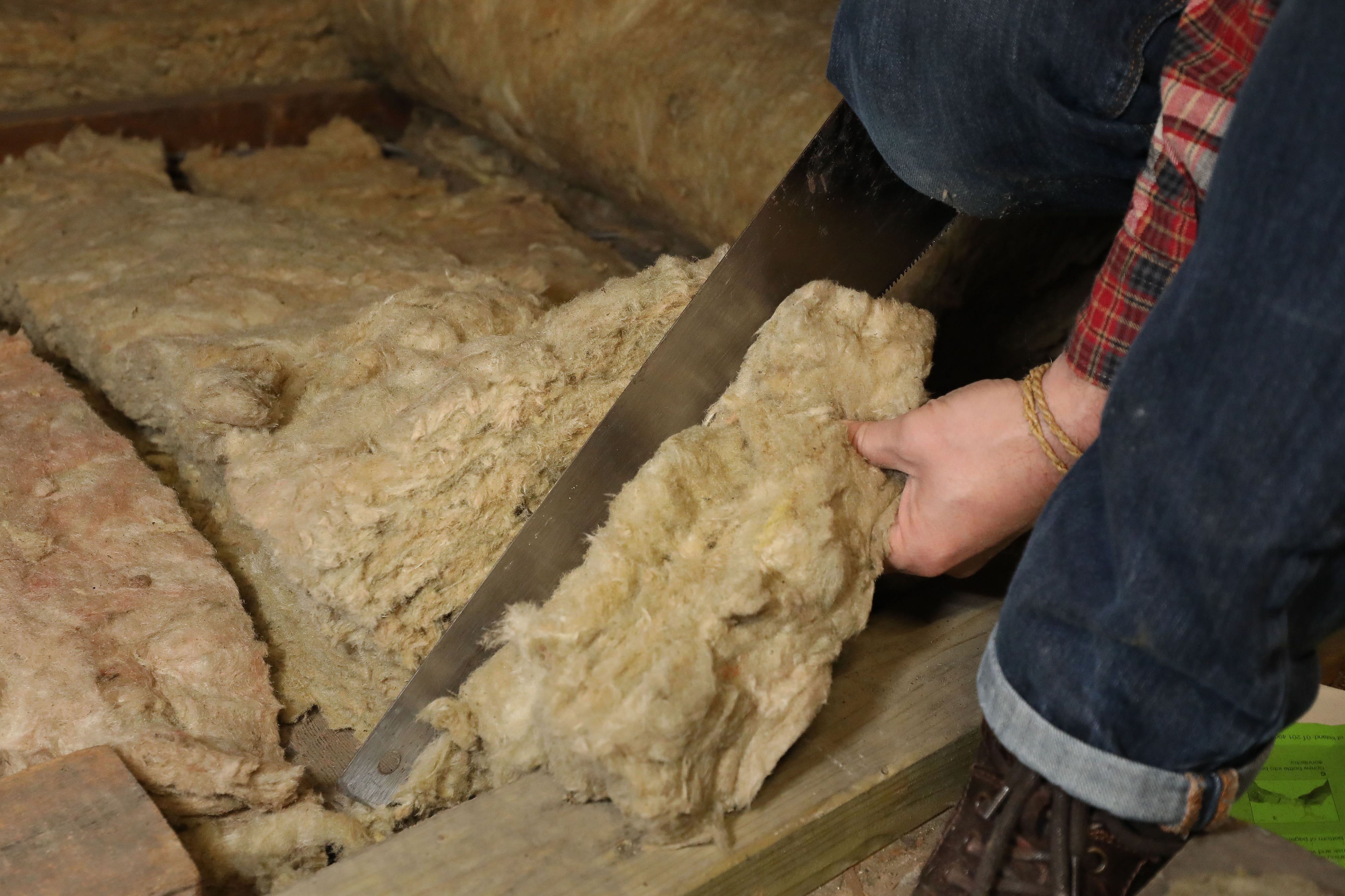 Insulation being laid in a loft (Philip Toscano/PA)