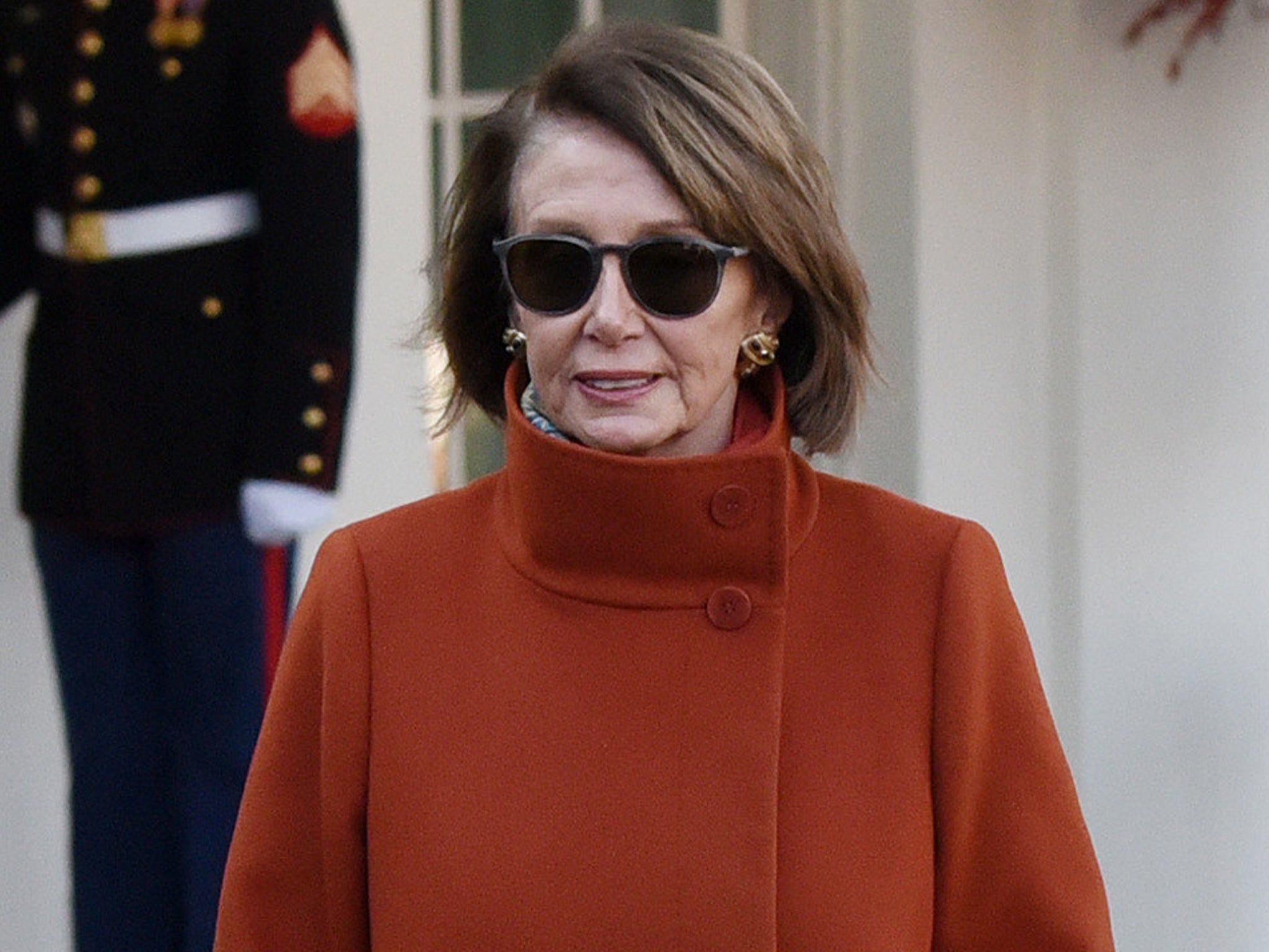 Pelosi in characteristic attire