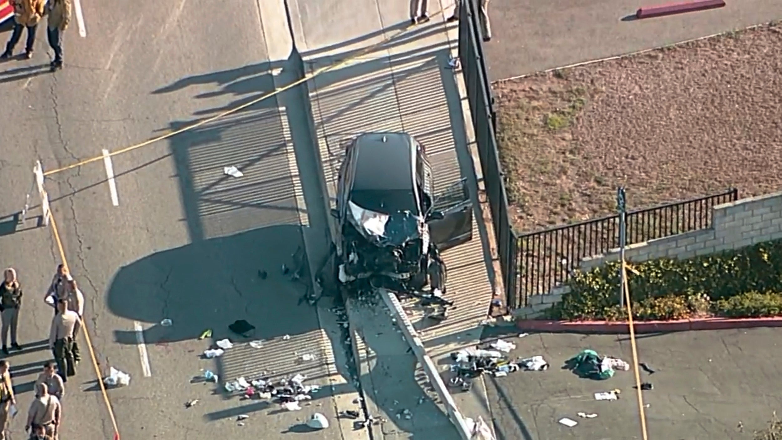 Investigators gather near an SUV that struck Los Angeles County sheriff’s recruits in the suburb of Whittier on 16 November 2022