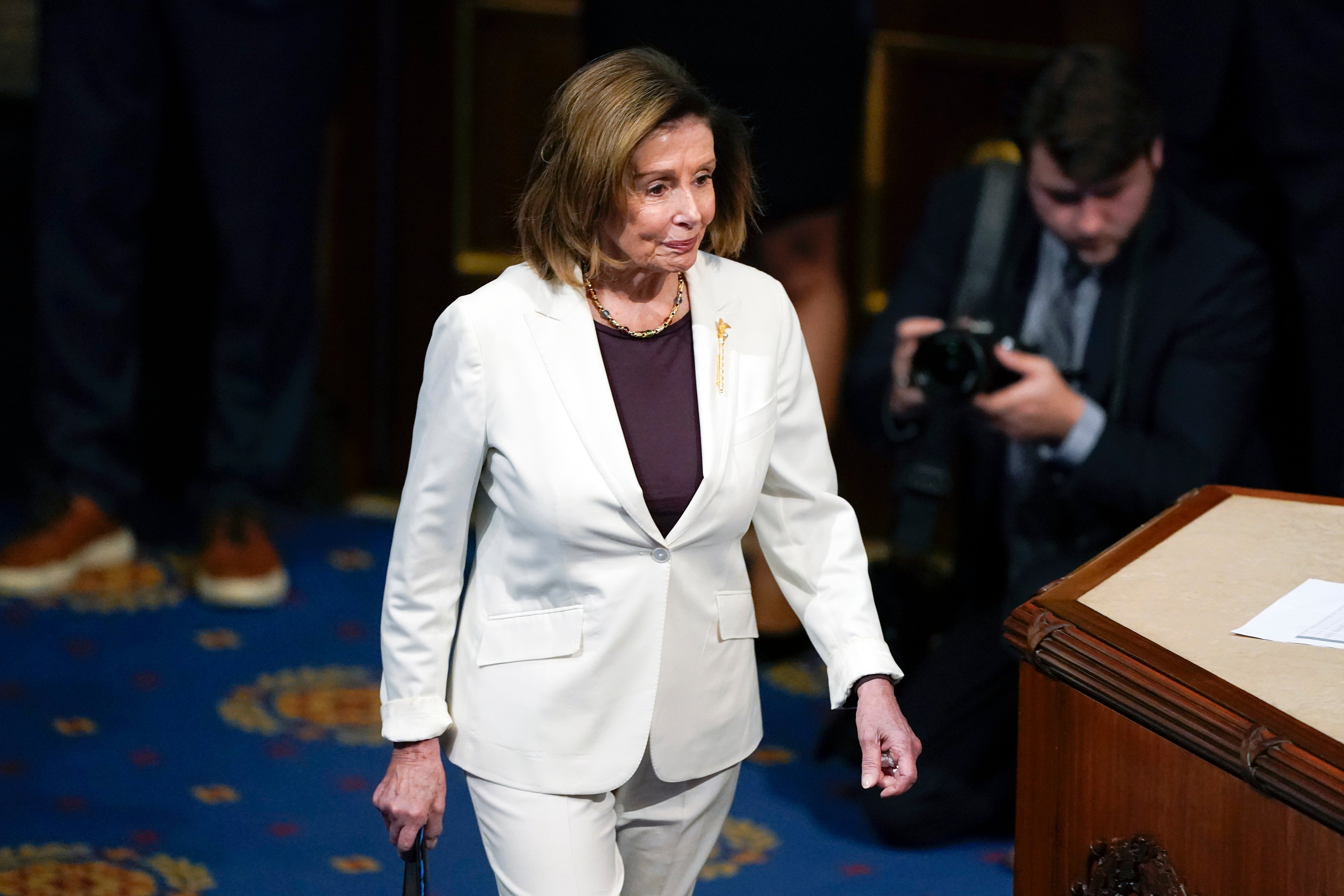 House Speaker Nancy Pelosi arrives to speak on the House floor at the Capitol in Washington on 17 November