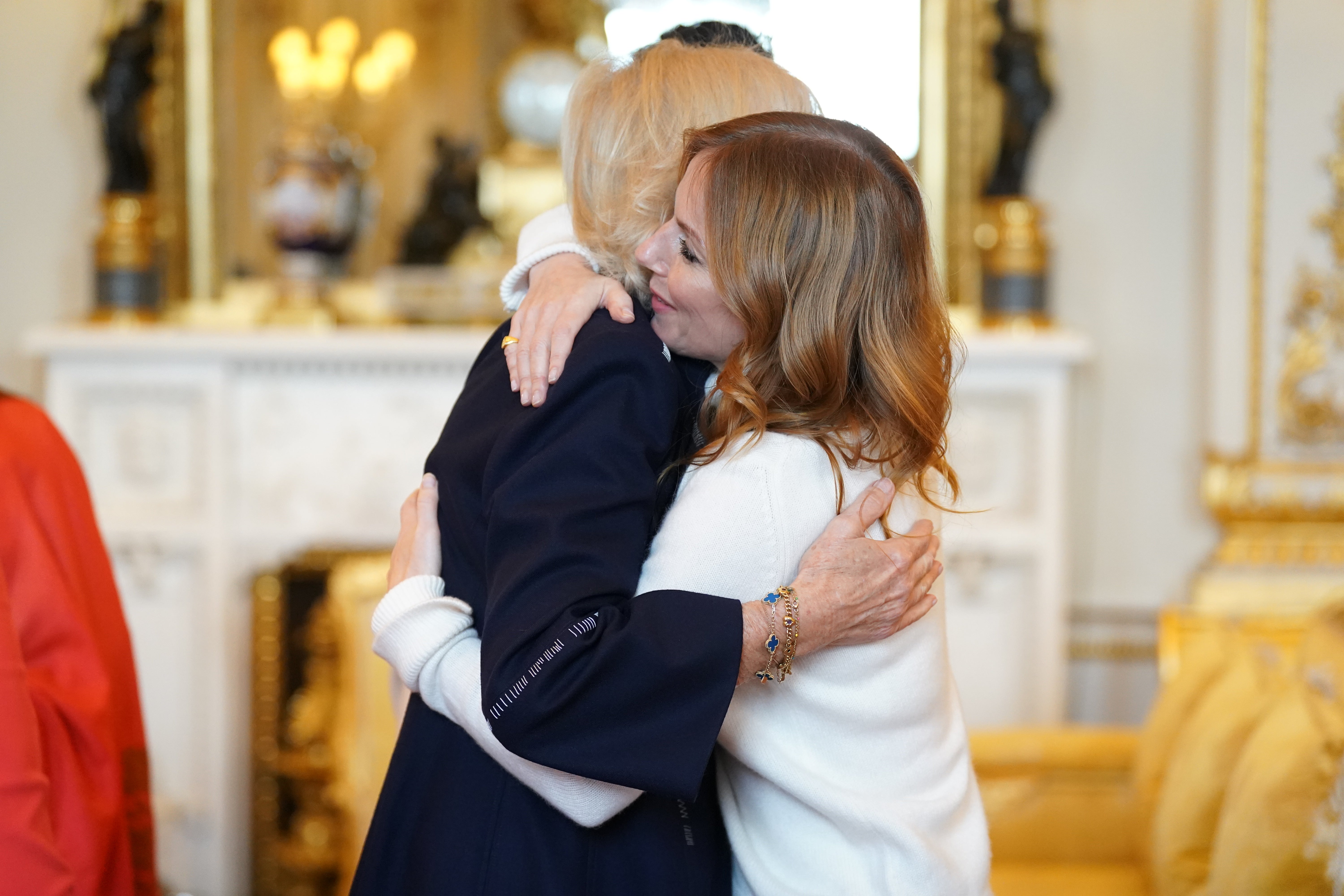 The Queen Consort with Geri Horner during a reception for winners of the Queen's Commonwealth Essay Competition, at Buckingham Palace