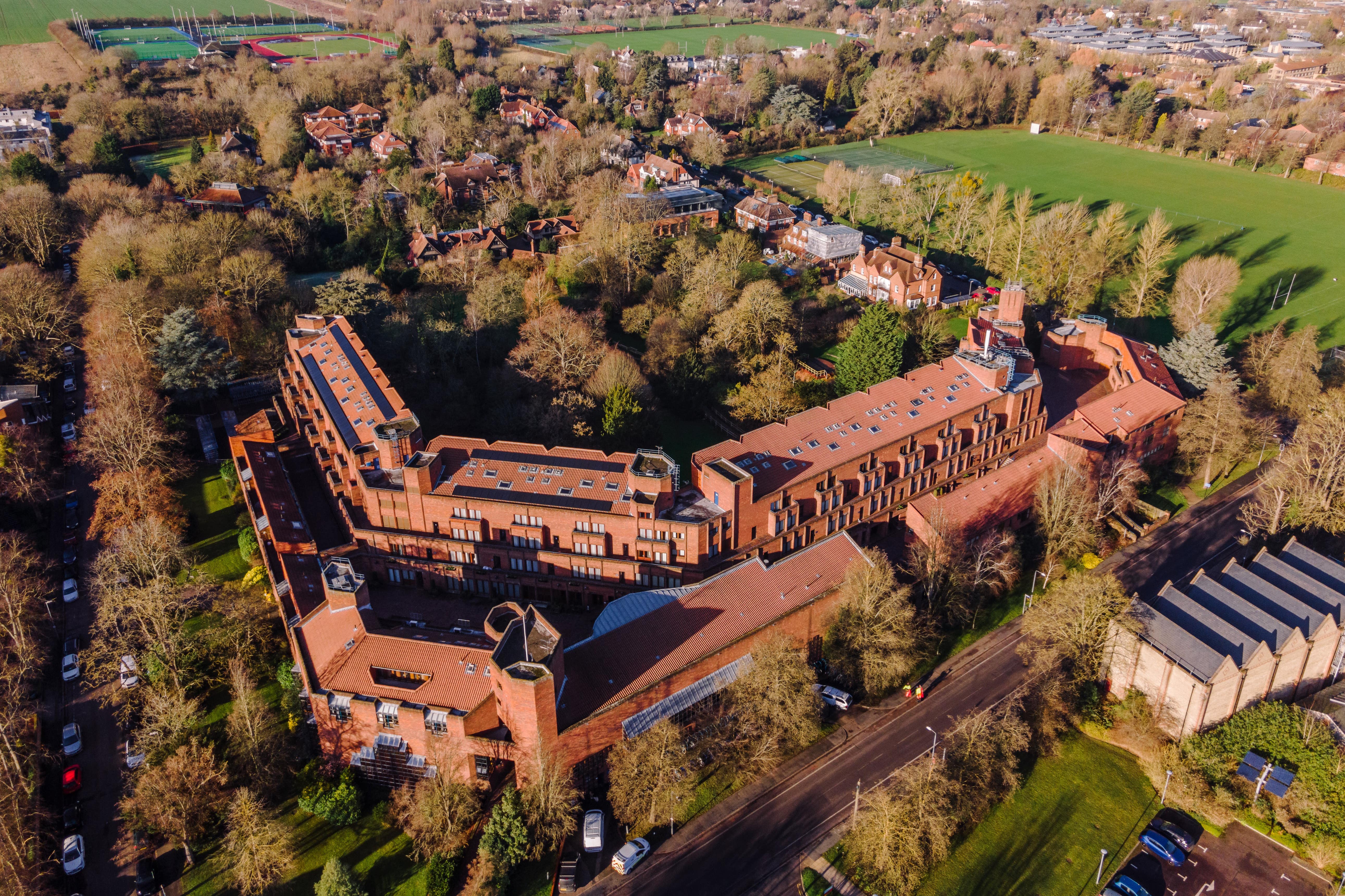 Cambridge’s Robinson College, which has been listed at Grade II* (Historic England/PA)