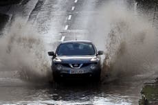 Amber weather warning extended as flooding closes schools, roads and railways