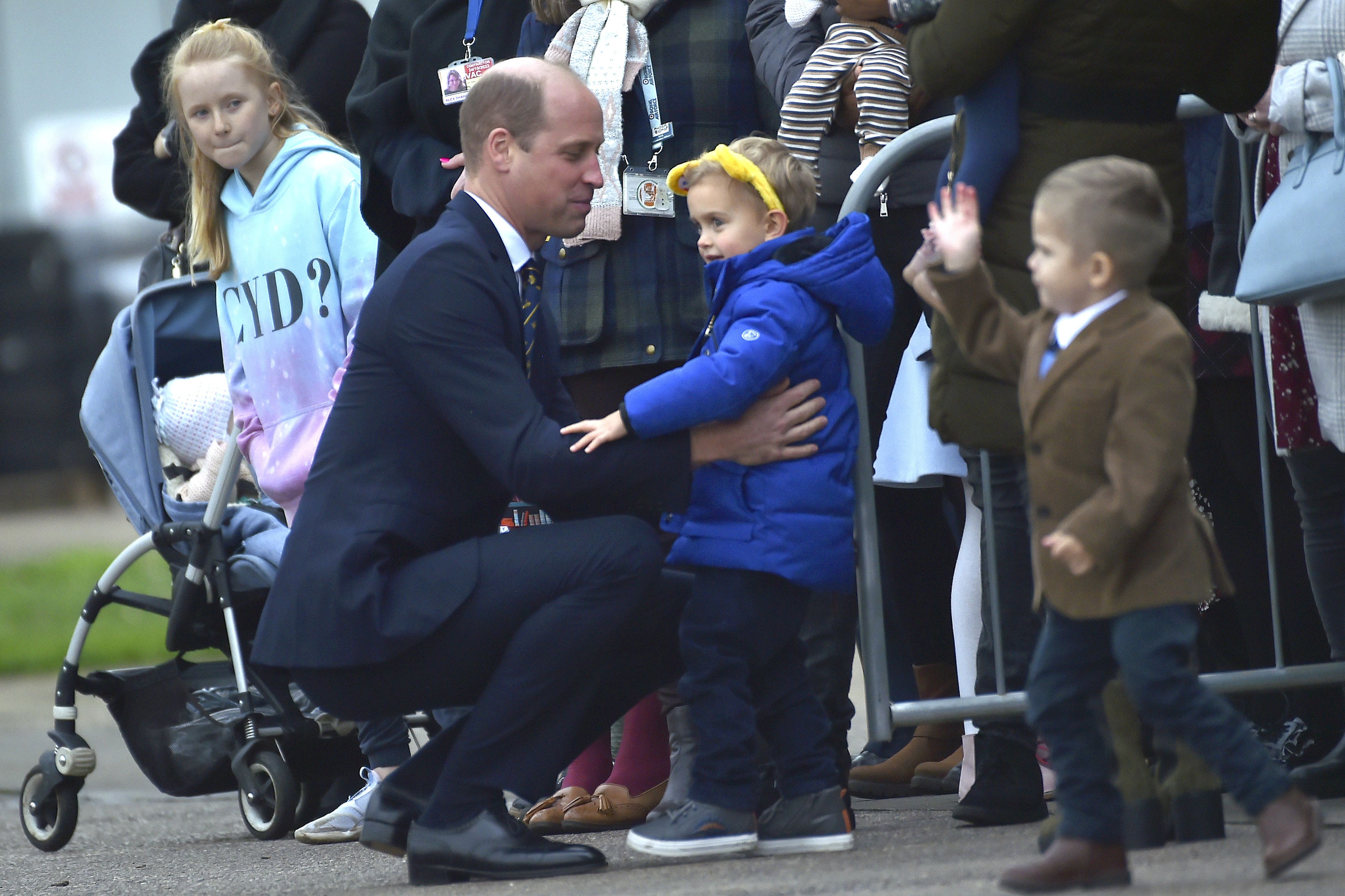 The Prince of Wales meeting family members of RAF personnel during a visit to RAF Coningsby (Rui Vieira/PA)