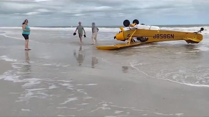 Florida man walks unscathed from plane crash after emergency landing on beach