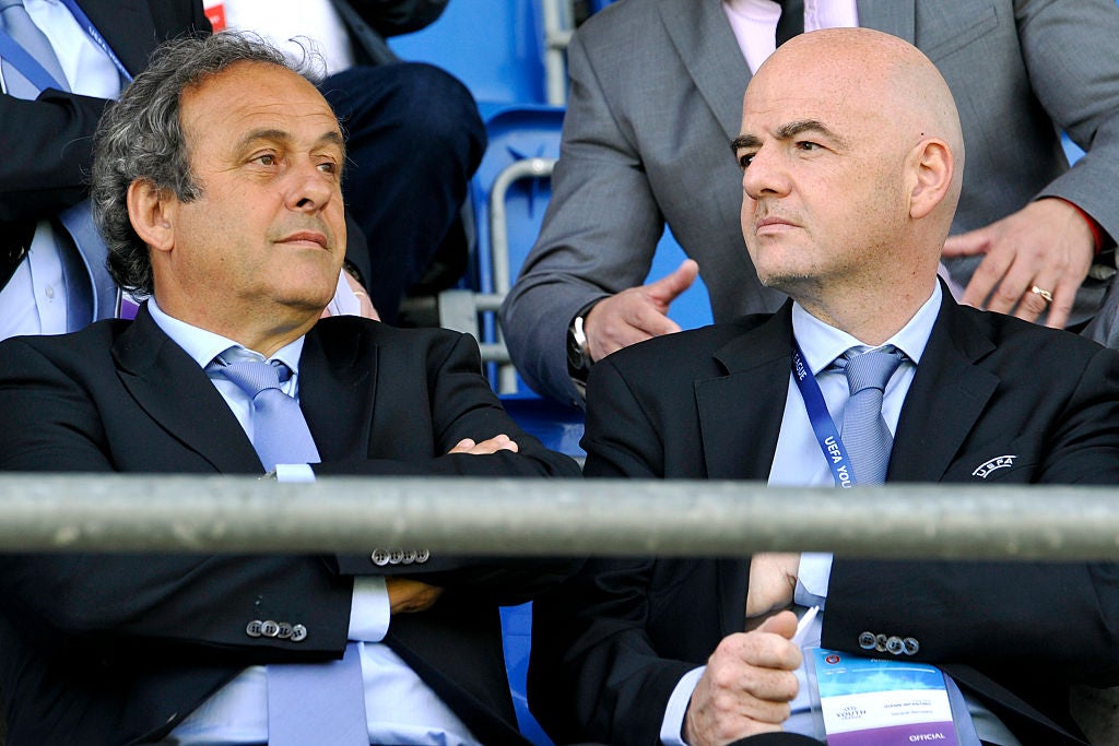 Former Uefa president Michel Platini with Infantino