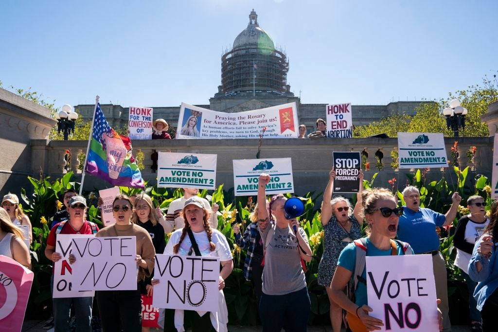 Supporters of abortion rights protest a pro-life rally in Kentucky, where voters rejected an effort to put language in the state Constitution specifiying that residents do not have the right to an abortion