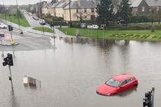 ‘Danger to life’ floods overwhelm homes, railways and roads in Scotland after 140mm of rain falls overnight