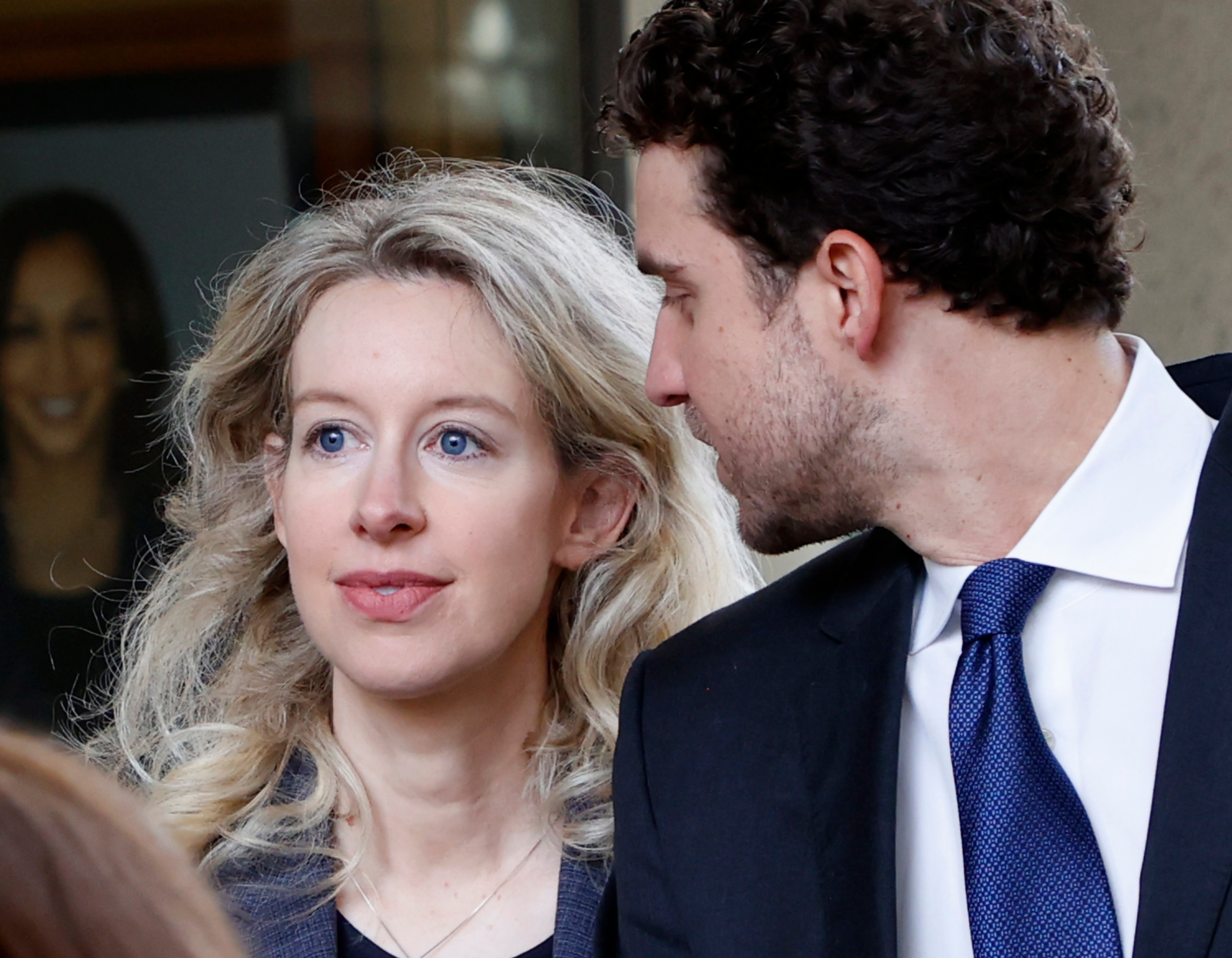 Elizabeth Holmes leaves court after her sentencing last month