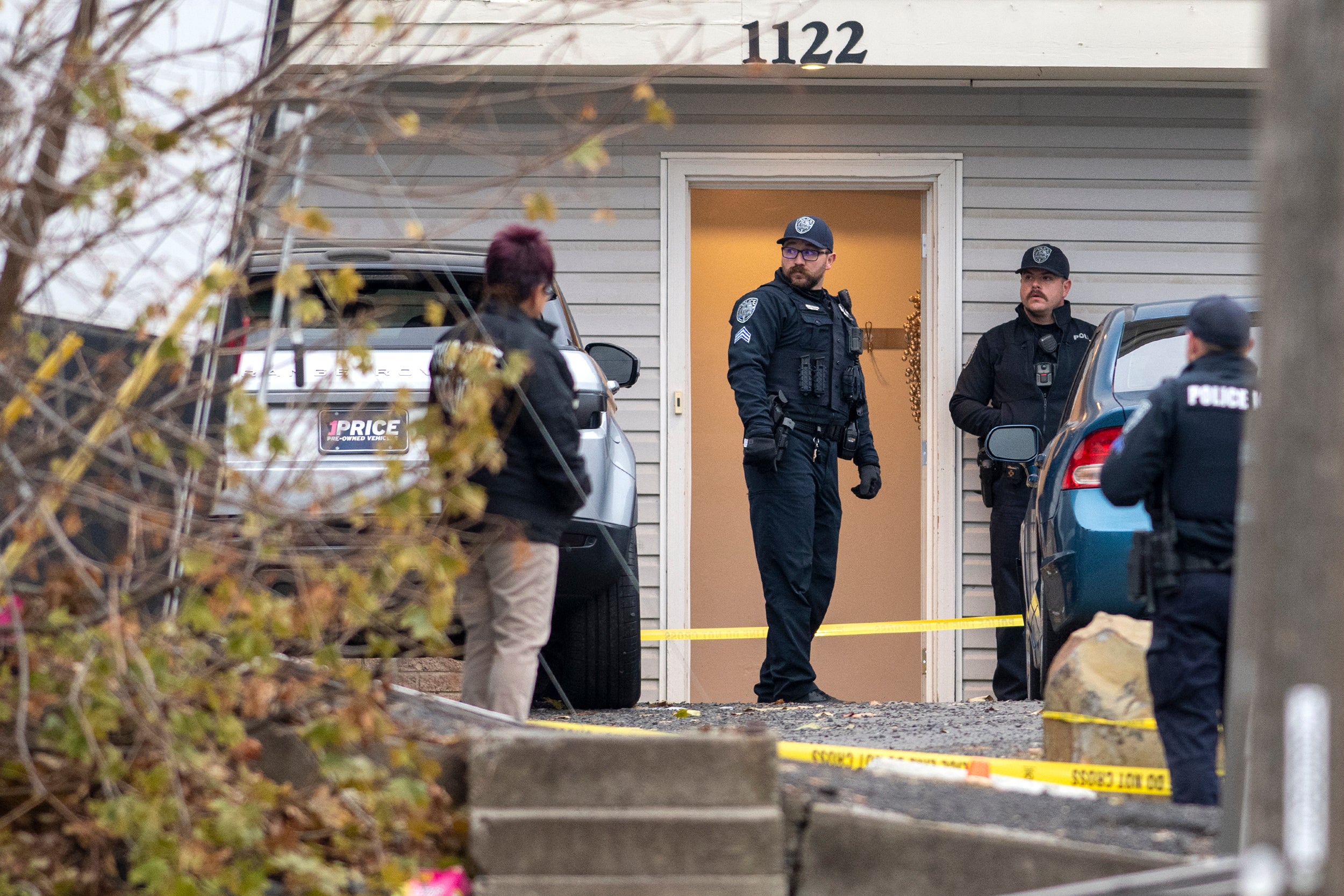 Investigators are seen at the home where the Idaho killings took place