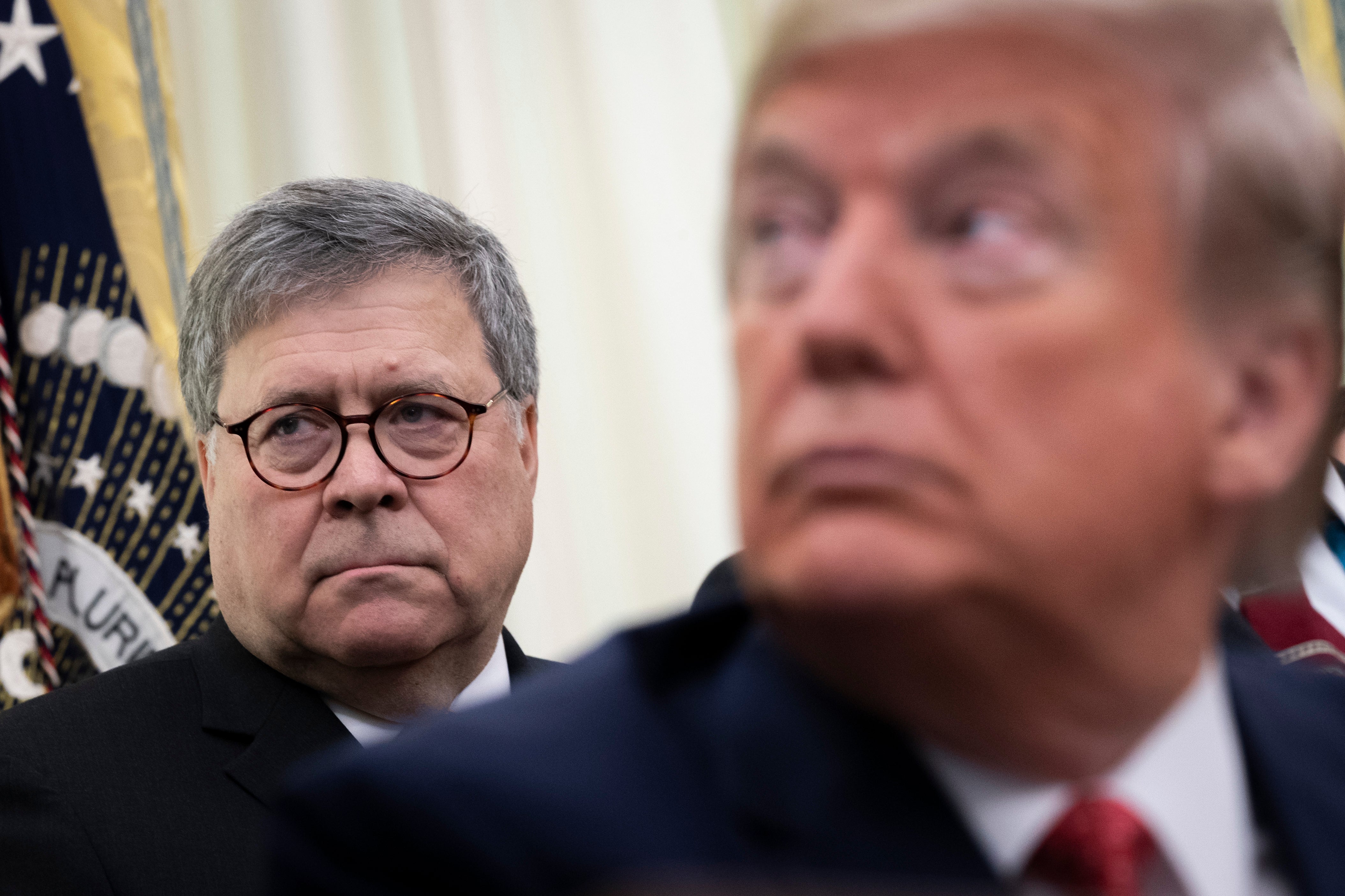 FILE- (L-R) U.S. Attorney General William Barr and U.S. President Donald Trump