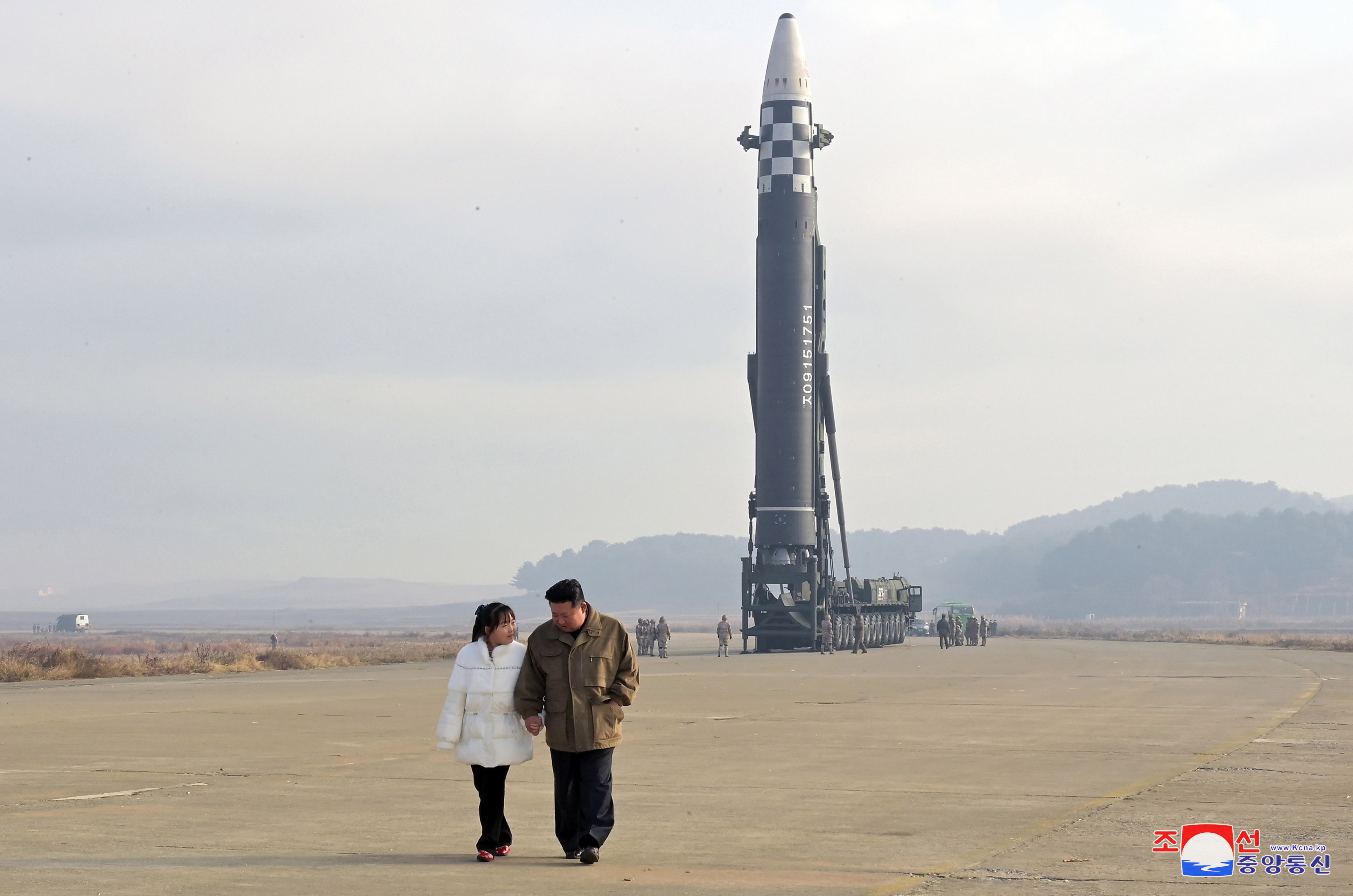 North Korean leader Kim Jong-un reveals daughter for first time at ICBM launch