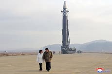 North Korean leader Kim Jong-un reveals daughter for first time at ICBM launch