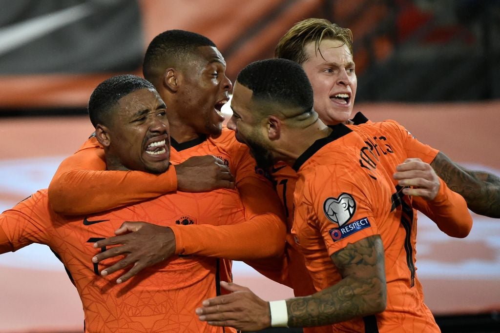 Steven Bergwijn (left) celebrates with teammates after scoring against Norway in qualifying