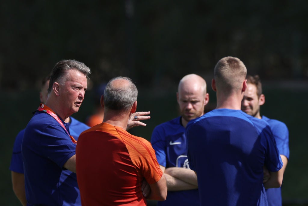 Van Gaal speaks with players during a training session at Qatar University in Doha