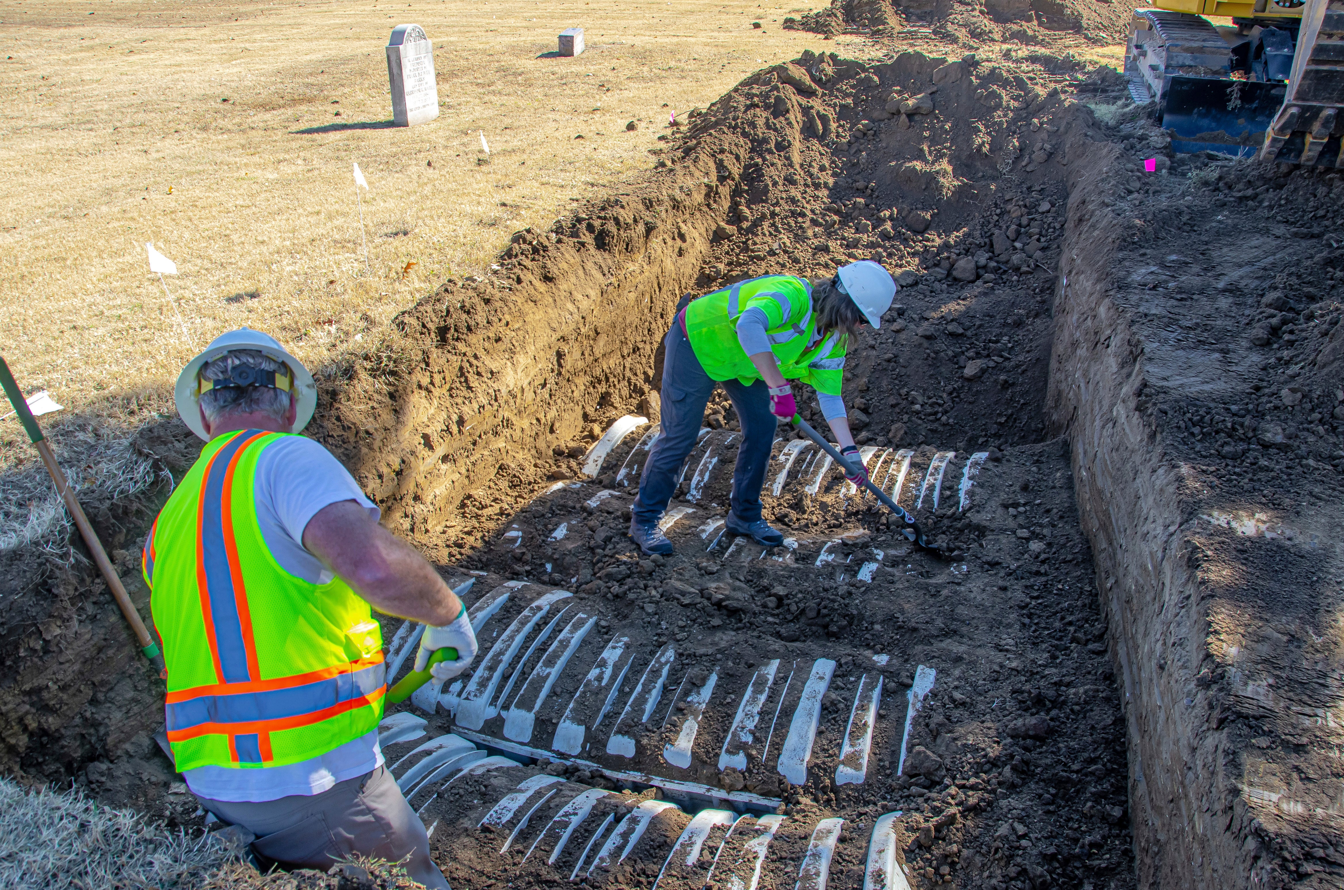 In a photo from 2022, crews are pictured working to recover human remains believed to be victims of the Tulsa race massacre from 1921