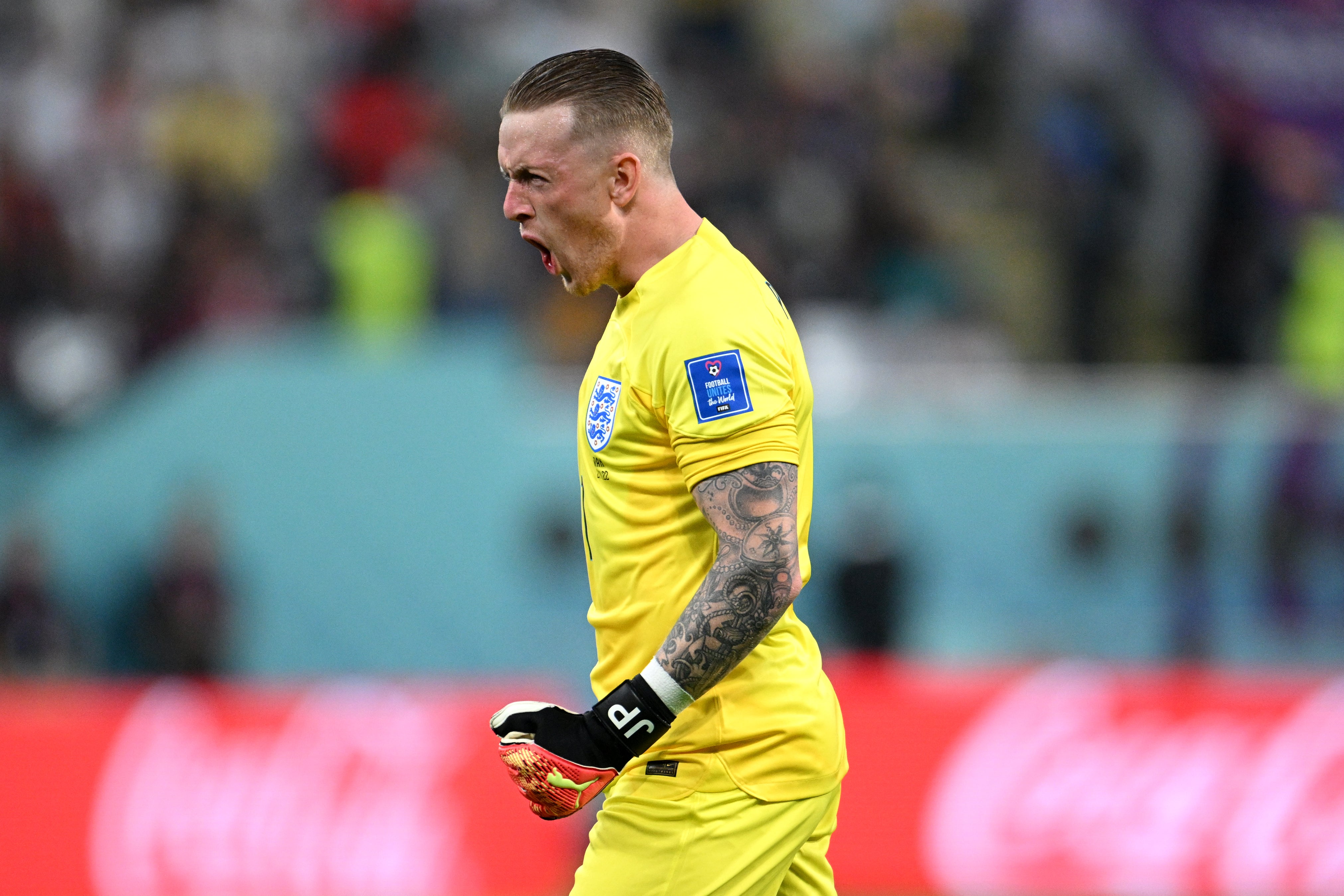 Jordan Pickford celebrates England’s third goal