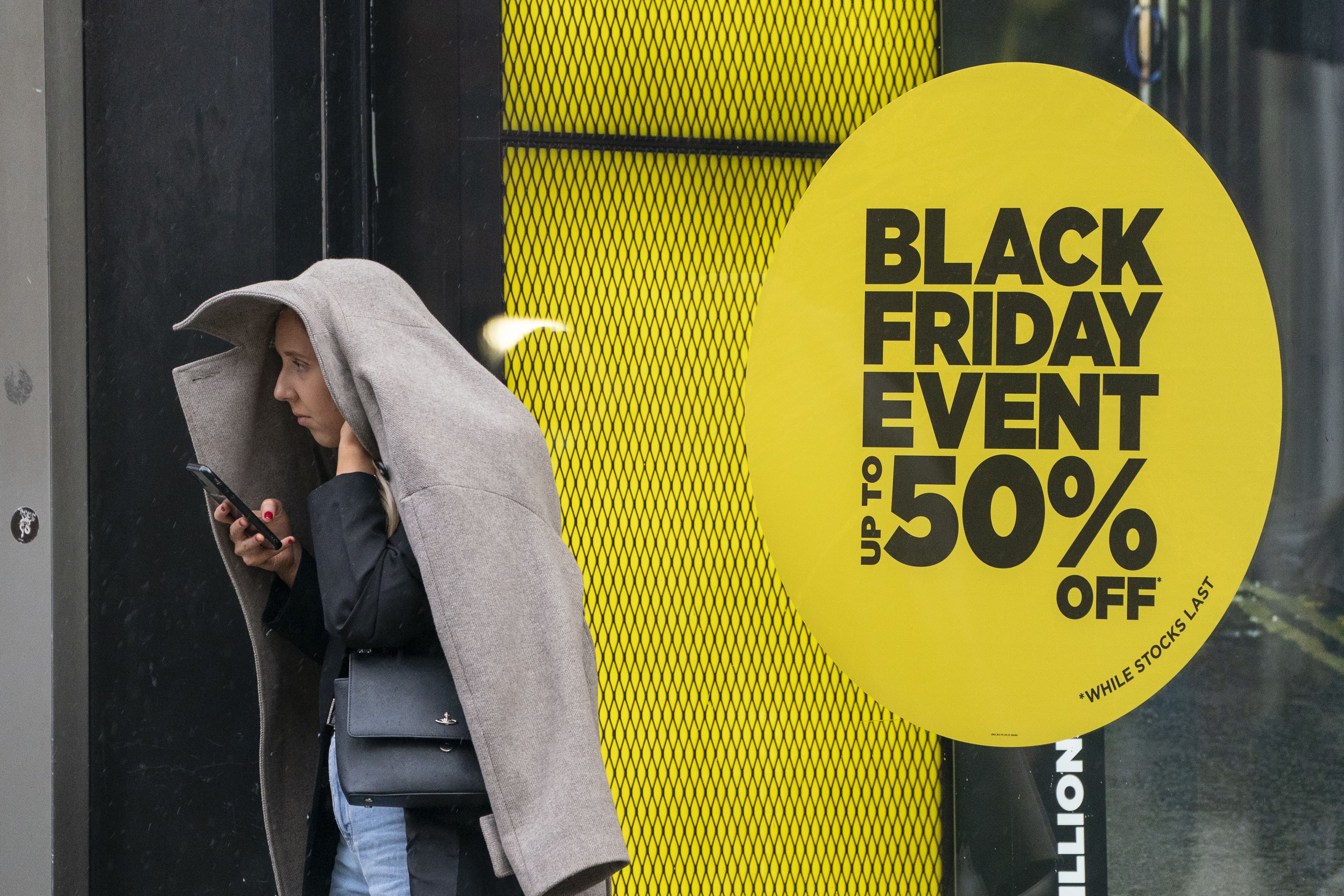 Shoppers on Oxford Street in London on Black Friday 2021 (Dominic Lipinski/PA)