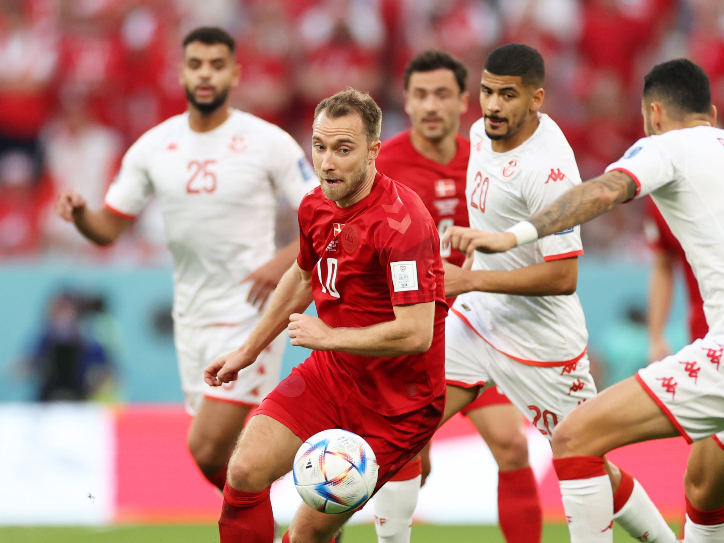 Christian Eriksen looks to carve an opening against Tunisia