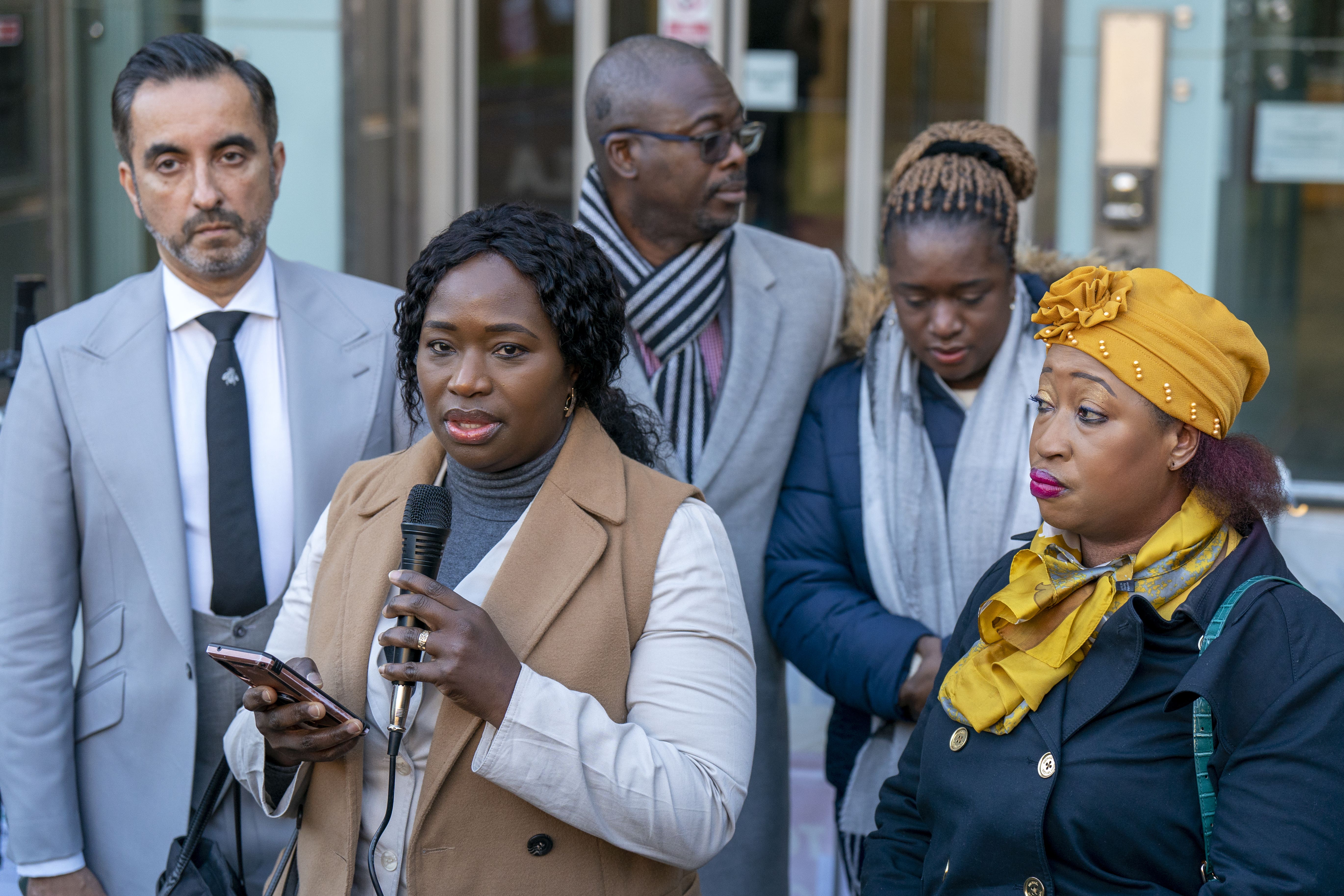(From left) Aamer Anwar with the sisters of Sheku Bayoh; Kadi Johnson, Adama Jalloh and Kosna Bayoh speak to supporters (Jane Barlow/PA)
