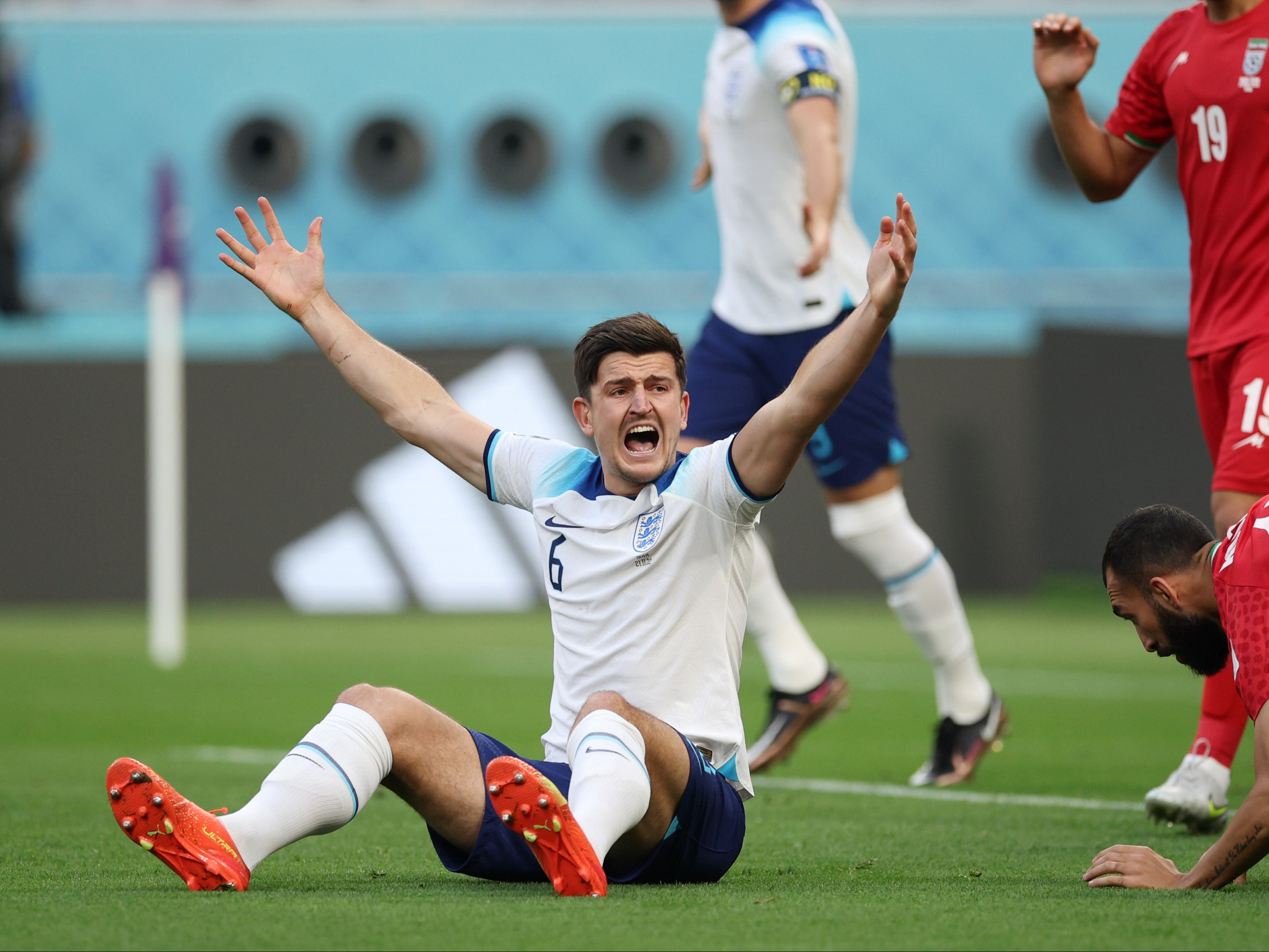 Harry Maguire of England appeals for a penalty against Iran