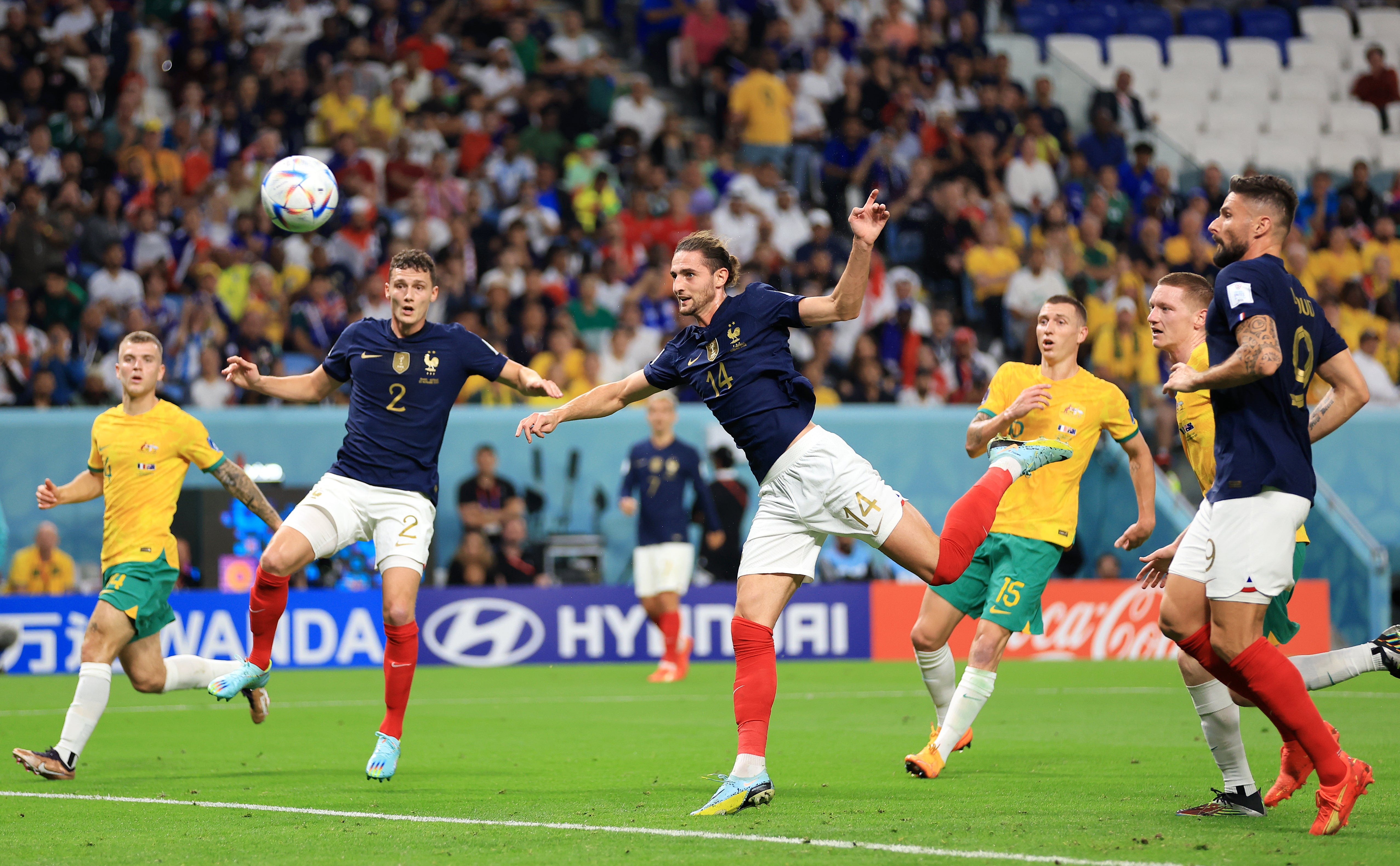 Adrien Rabiot rises to head home France’s equaliser against Australia