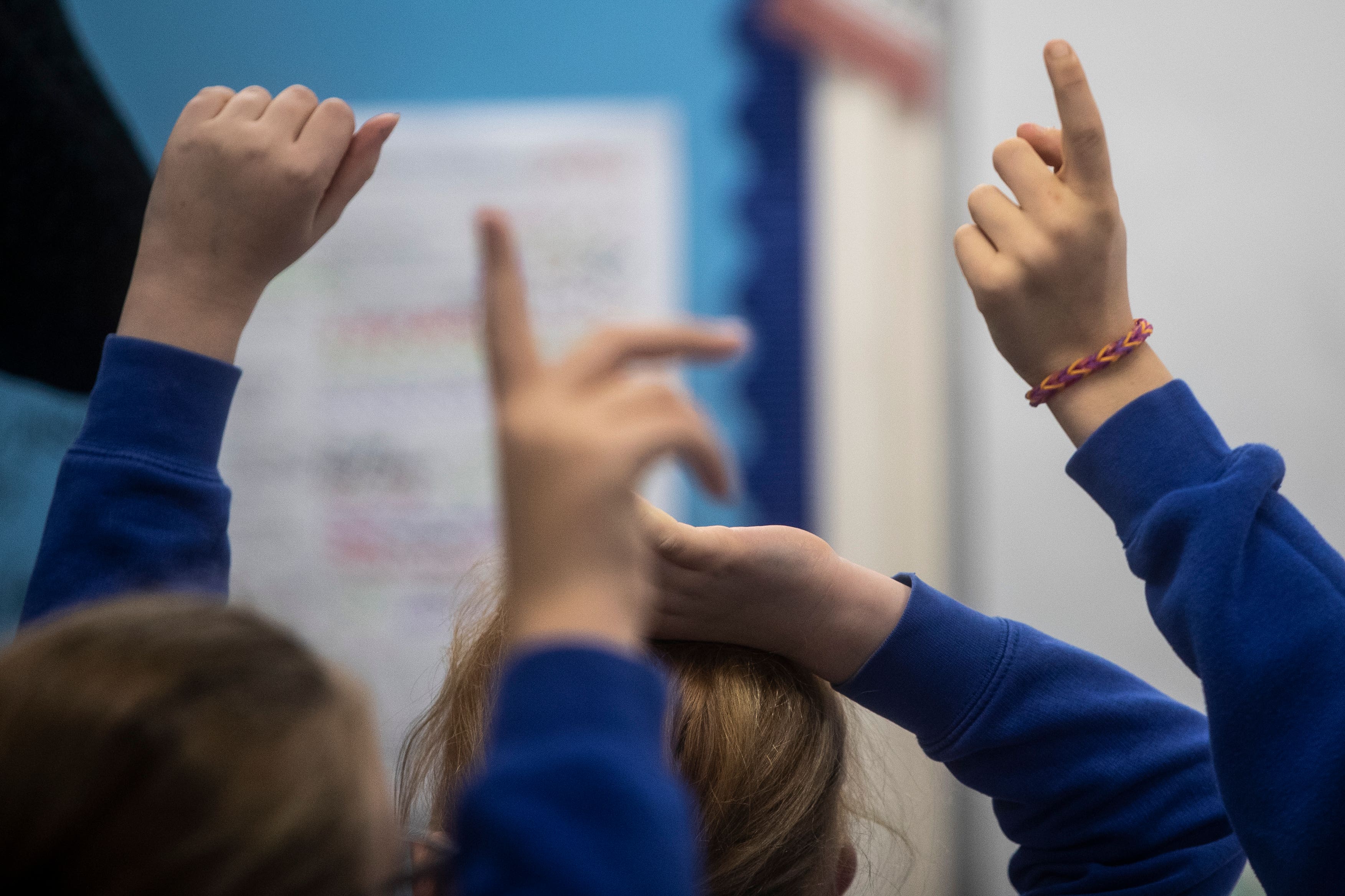 Disadvantaged pupils have fallen behind their peers in reading and maths skills, a study has found (Danny Lawson/PA)