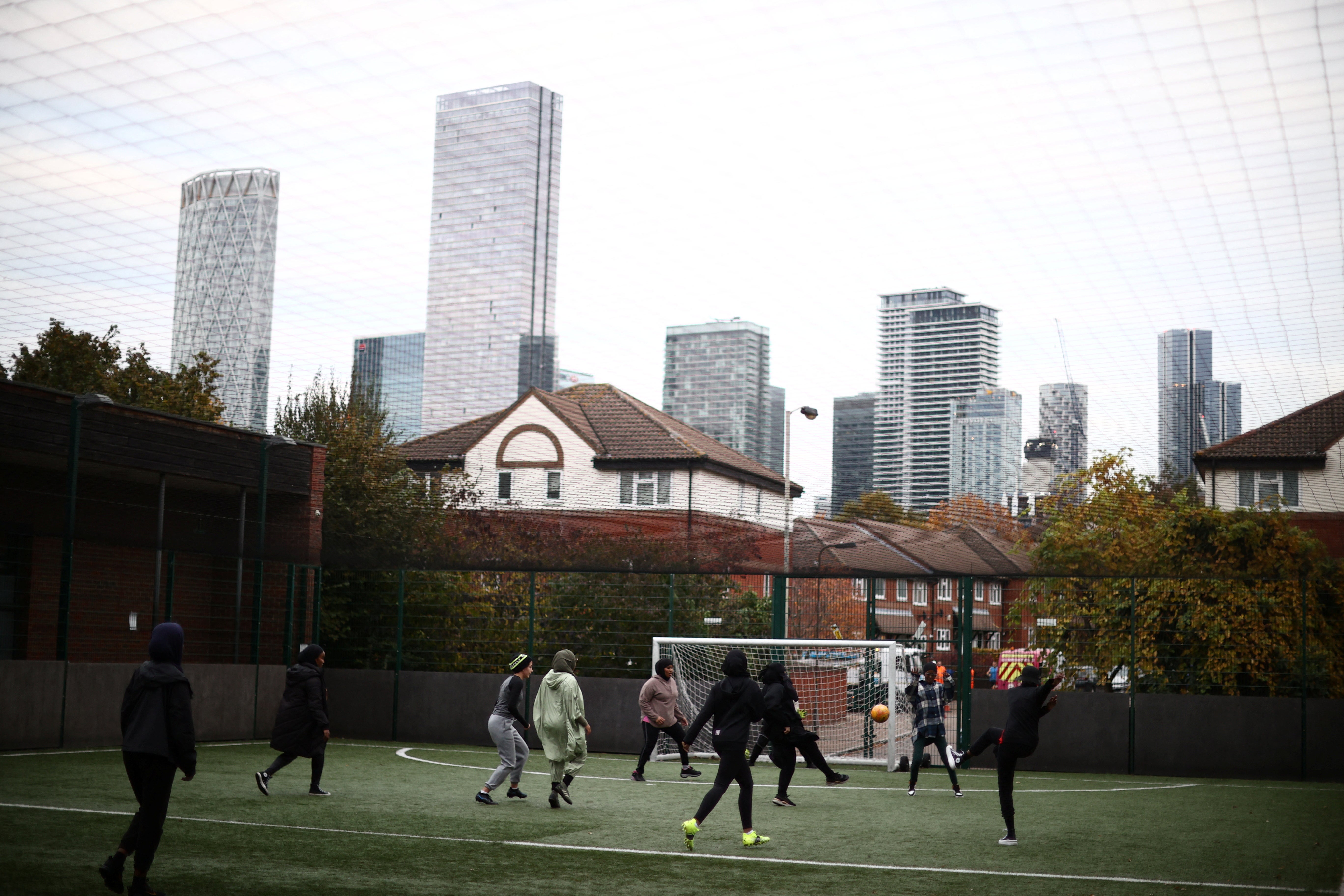 Sisterhood FC team members practice during a training session at Dockland Settlements Community Centre