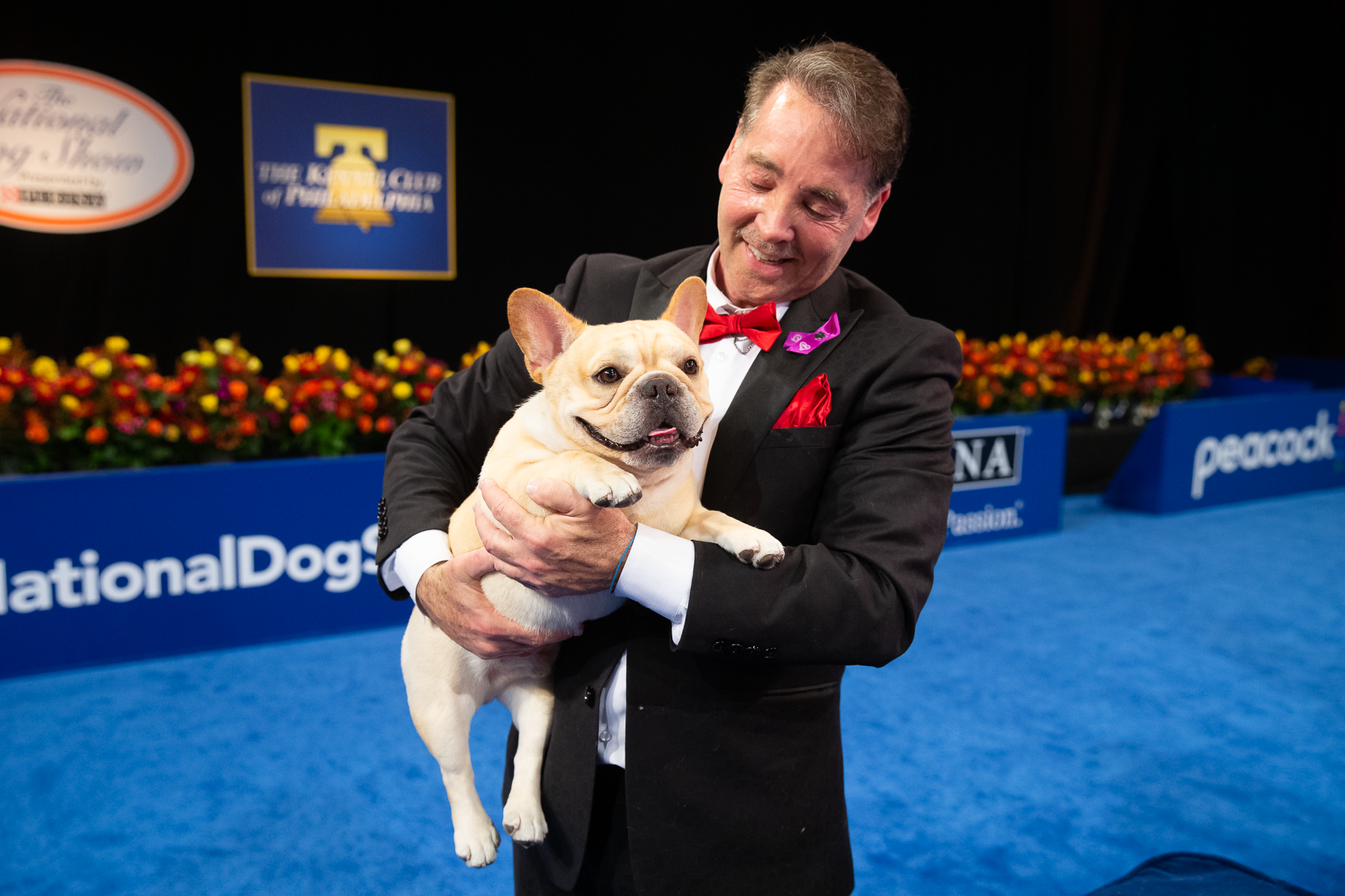 Winston the French bulldog with his handler and co-owner, Perry Payson