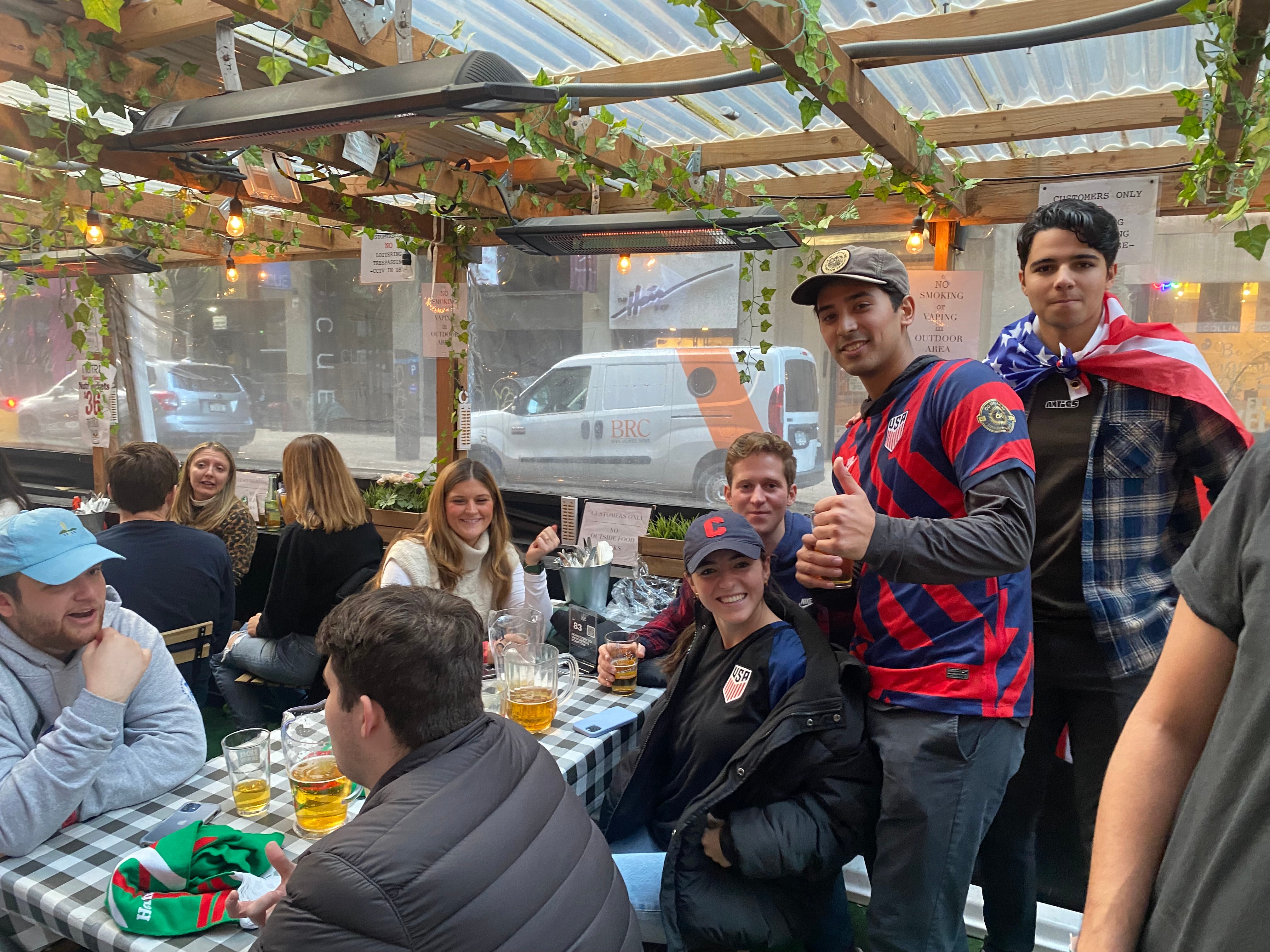 Aaron Angeles, a 22-year-old New Yorker and lifelong soccer fan, takes in the England v USA game at a NYC bar