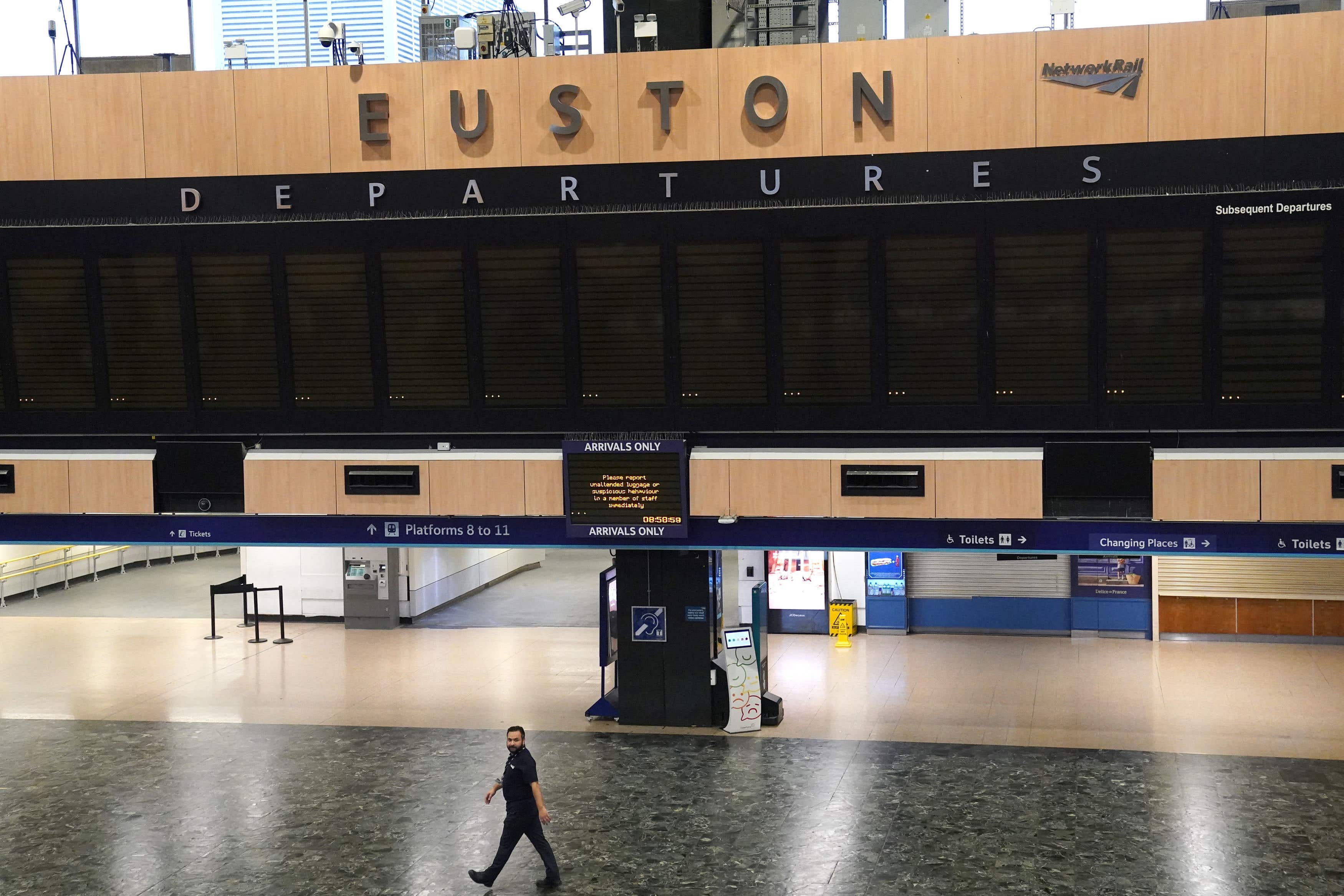 Empty departures board at Euston station in London