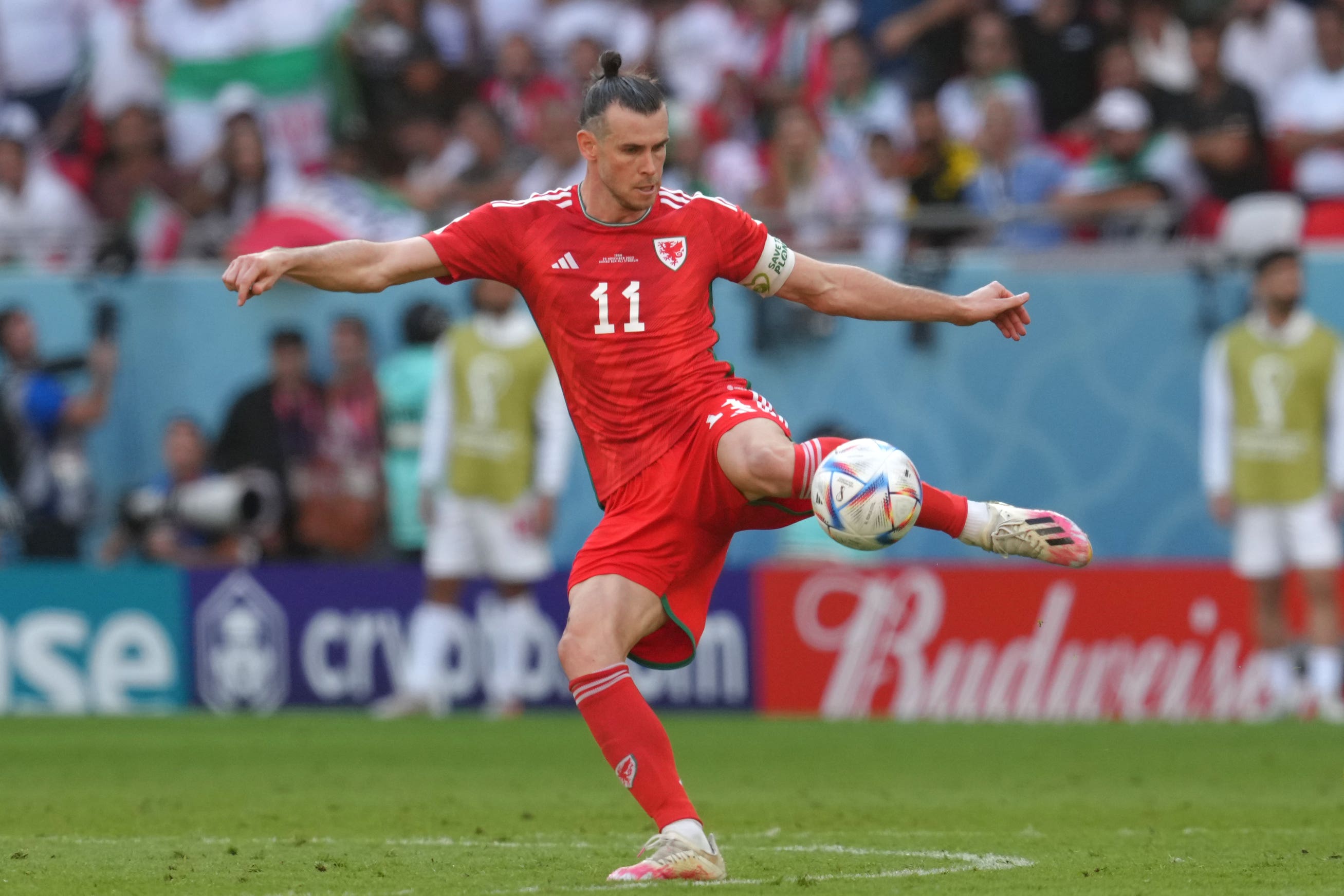 Gareth Bale in the Wales v Iran game. Welsh football is in mourning after a member of the Red Wall in Qatar with his son for the World Cup died (PA)