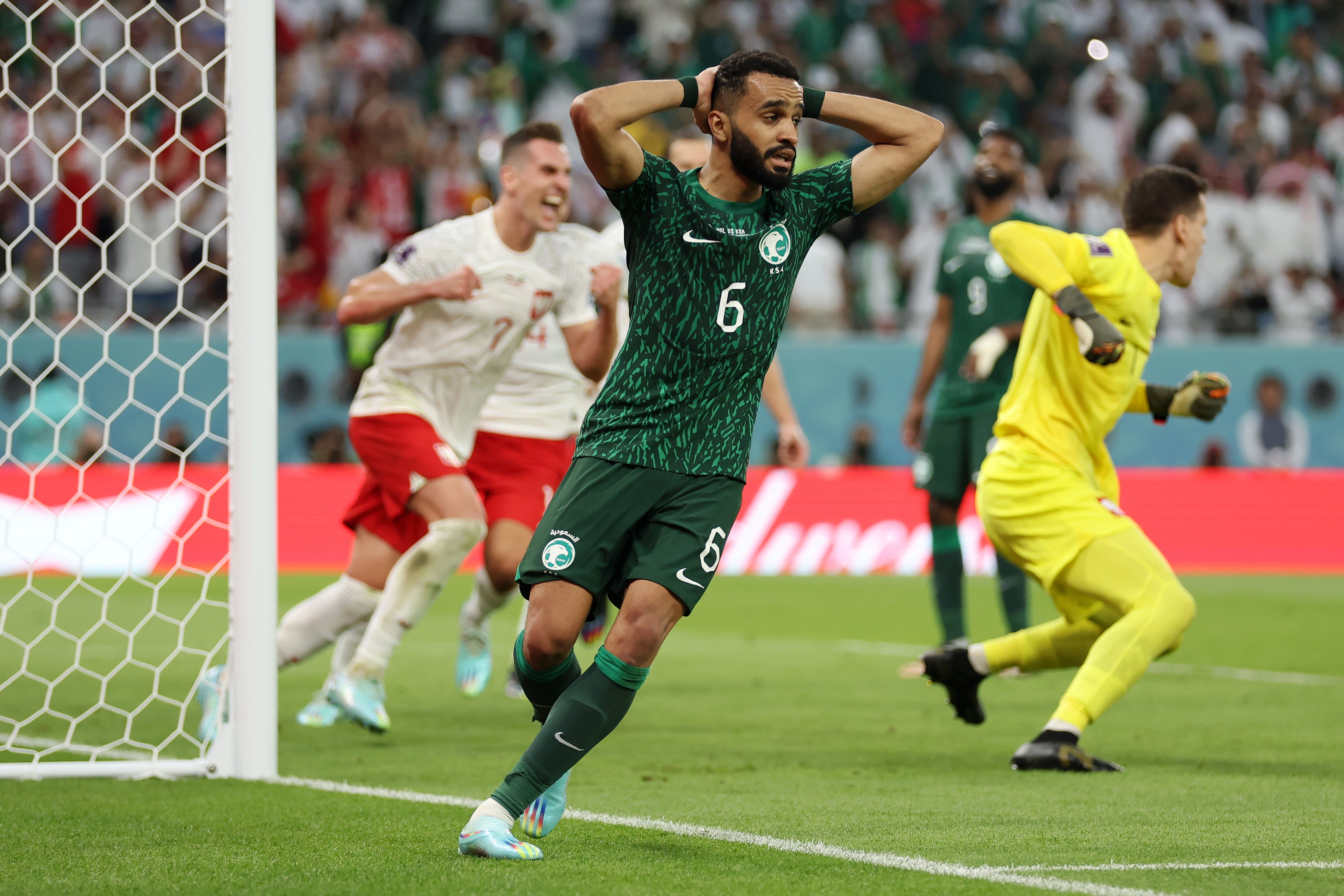 Al-Burayk reacts after his attempt is saved by Szczesny of Poland